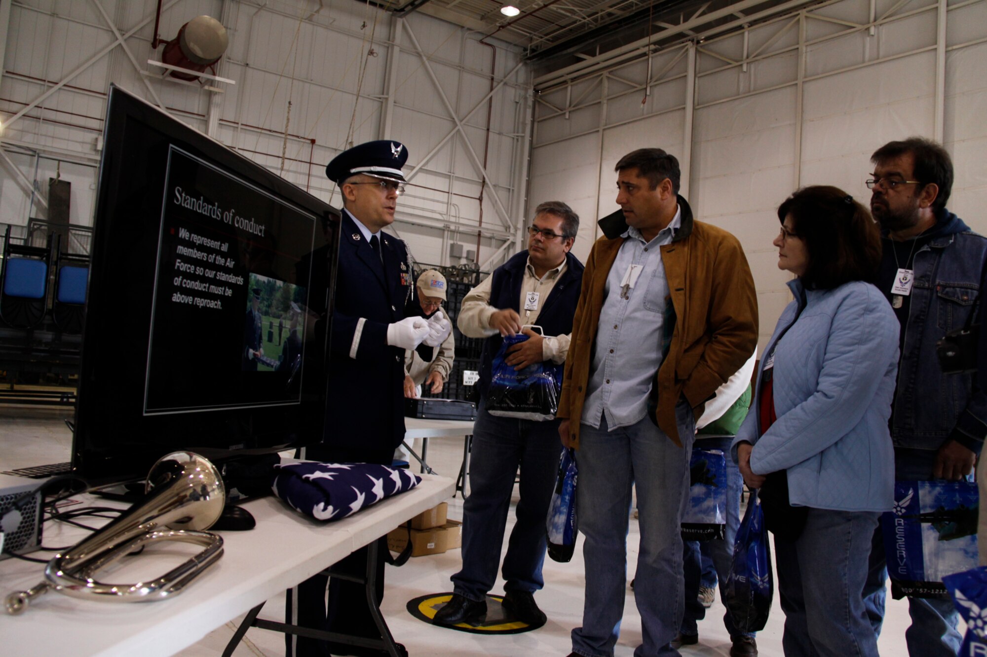 Master Sgt. Brian Allison, 911th Airlift Wing Honor Guard manager, speaks to local employer’s about the important role the Honor Guard and Color Guard play in the military’s overall mission, Oct. 2, during Employer’s Day 2010. Employer’s had the opportunity to view displays, talk with Reservists, observe demonstrations, receive several briefi ngs and fl y in a C-130 Hercules cargo aircraft. (Photo by Senior Airman Joshua J. Seybert) 
