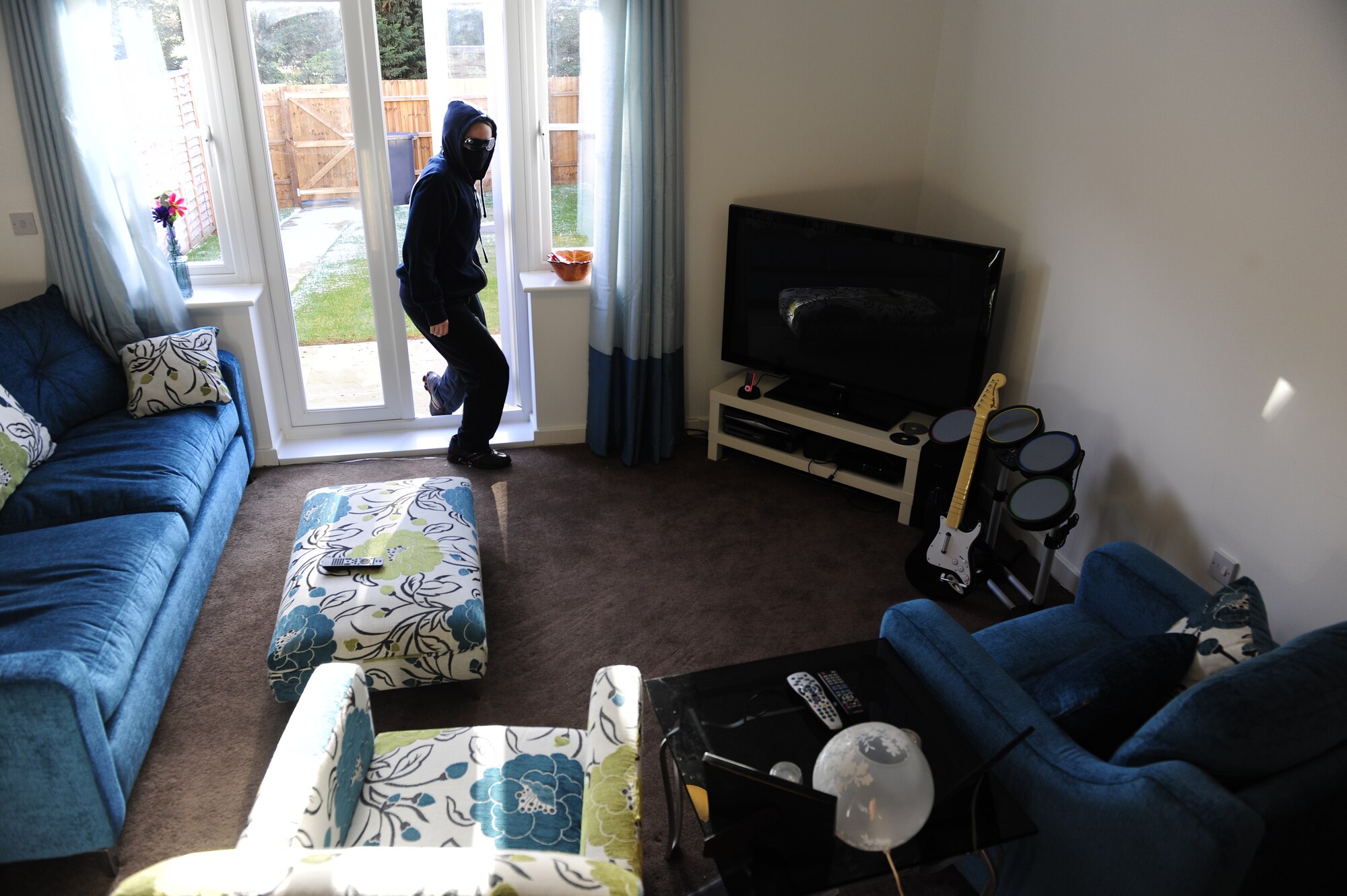 ROYAL AIR FORCE LAKENHEATH, England - Crime typically rises during the holiday season as criminals take advantage of the abundance of valuables. To avoid being an easy target, one should always lock their home’s doors and windows and make a habit of locking their car doors regardless of location. (Editor’s Note: this photo was staged and does not depict an actual crime.) (U.S. Air Force photo/Senior Airman Stephen Linch) 