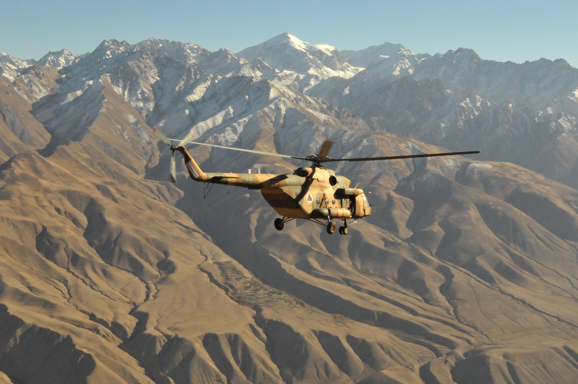 BAHARK, Afghanistan -- An Mi-17 helicopter flies to Kabul coming back from a humanitarian assistance mission in Baharak, Badakhshan province, Afghanistan. (Photo by MC2 Vladimir Potapenko/RELEASED)