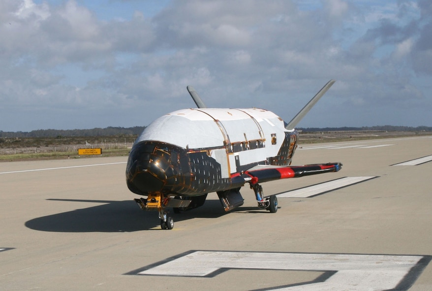 In a testing procedure, the X-37B Orbital Test Vehicle taxis on the flightline in June 2009 at Vandenberg Air Force Base, Calif. (Courtesy photo)