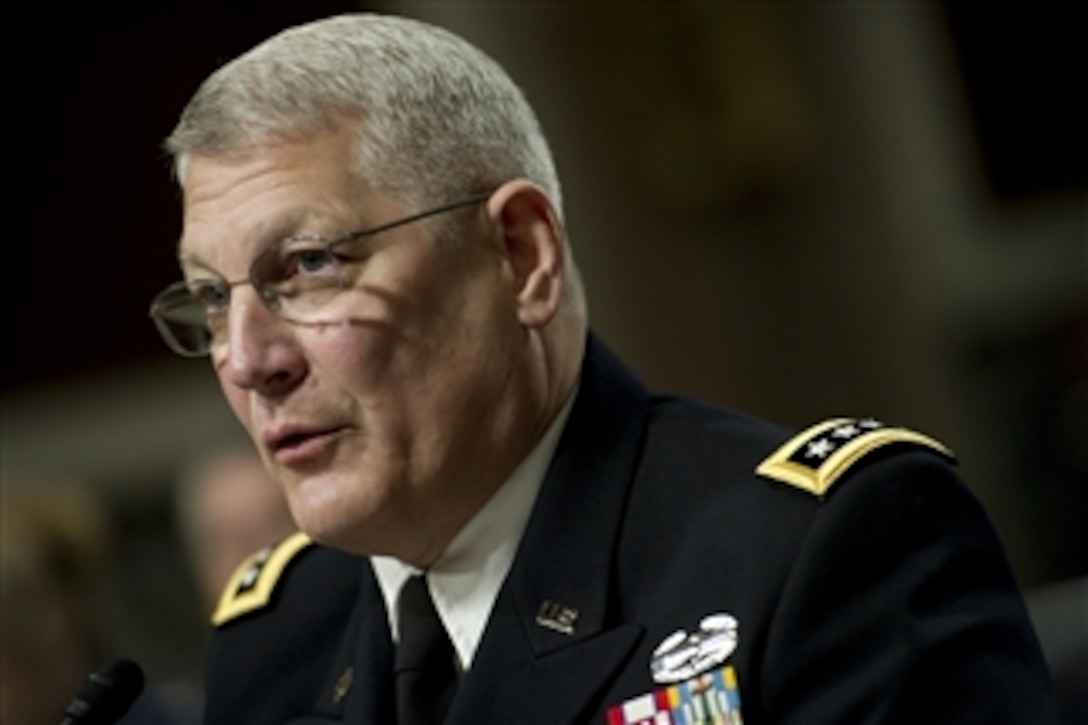 Commander, U.S. Army Europe Gen. Carter Ham appears before the Senate Armed Services Committee regarding the findings of the "Don't Ask, Don't Tell" Comprehensive Working Group report on Dec. 2, 2010.  Secretary of Defense Robert M. Gates, Chairman of the Joint Chiefs of Staff Adm. Mike Mullen and Department of Defense General Counsel Jeh C. Johnson appeared before the committee regarding the findings of the survey.  