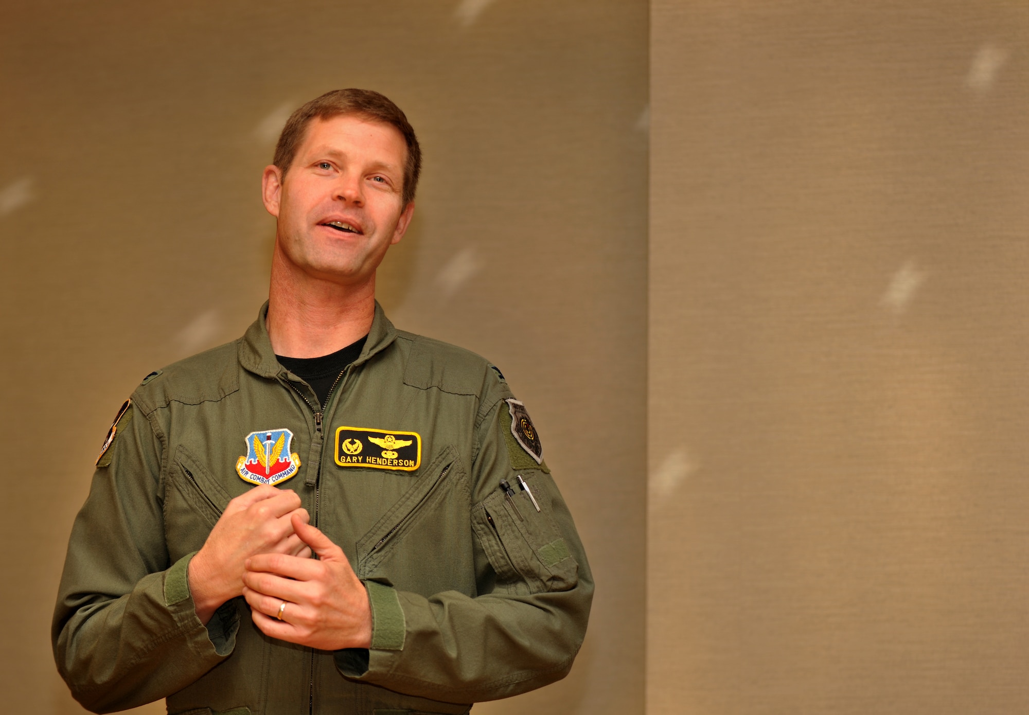 MOODY AIR FORCE BASE, Ga.-- Col. Gary Henderson, 23rd Wing commander, provides his remarks about the time spent with Chief Master Sgt. Richard Parsons, 23rd Wing command chief, during his going-away luncheon Dec. 3. Colonel Henderson spoke of the good times providing a light-hearted moment. (U.S. Air Force photo/Airman 1st Class Joshua Green)(RELEASED)

