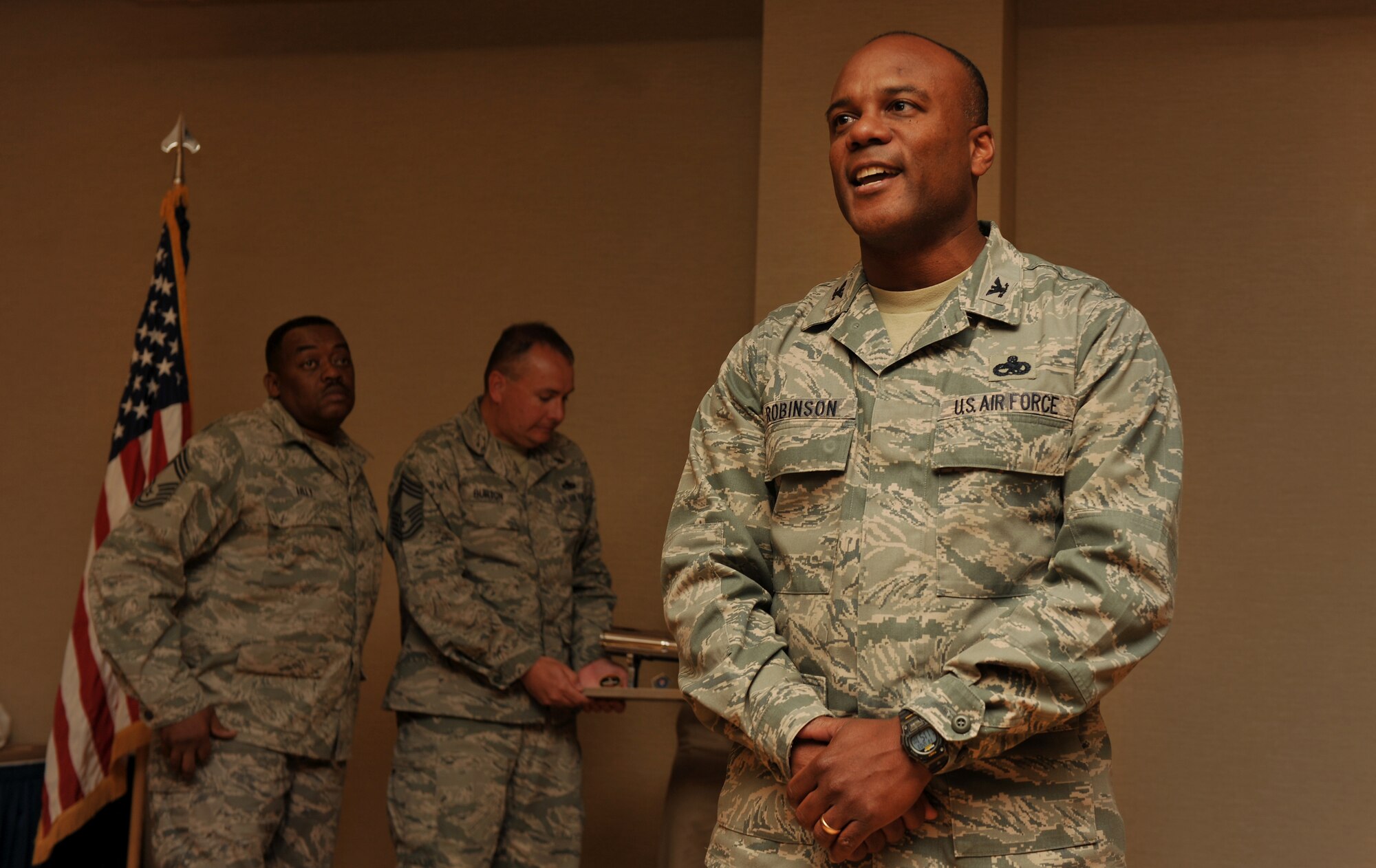 MOODY AIR FORCE BASE, Ga.-- Col. Neal Robinson, 23rd Maintenance Group commander, speaks during the going-away luncheon of Chief Master Sgt. Richard Parsons, 23rd Wing command chief, he spoke about  his experience with the command chief. (U.S. Air Force photo/Airman 1st Class Joshua Green)(RELEASED)
