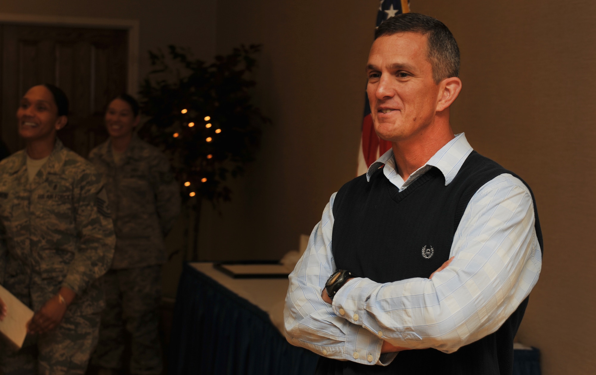 MOODY AIR FORCE BASE, Ga.-- Chief Master Sgt. Richard Parsons, 23rd Wing command chief, tries to hold back a laugh during his going-away luncheon Dec. 3. Chief Parsons has been an inspiration to all Airmen from lowest to highest ranking as his time as Moody’s command chief. (U.S. Air Force photo/Airman 1st Class Joshua Green)(RELEASED)
