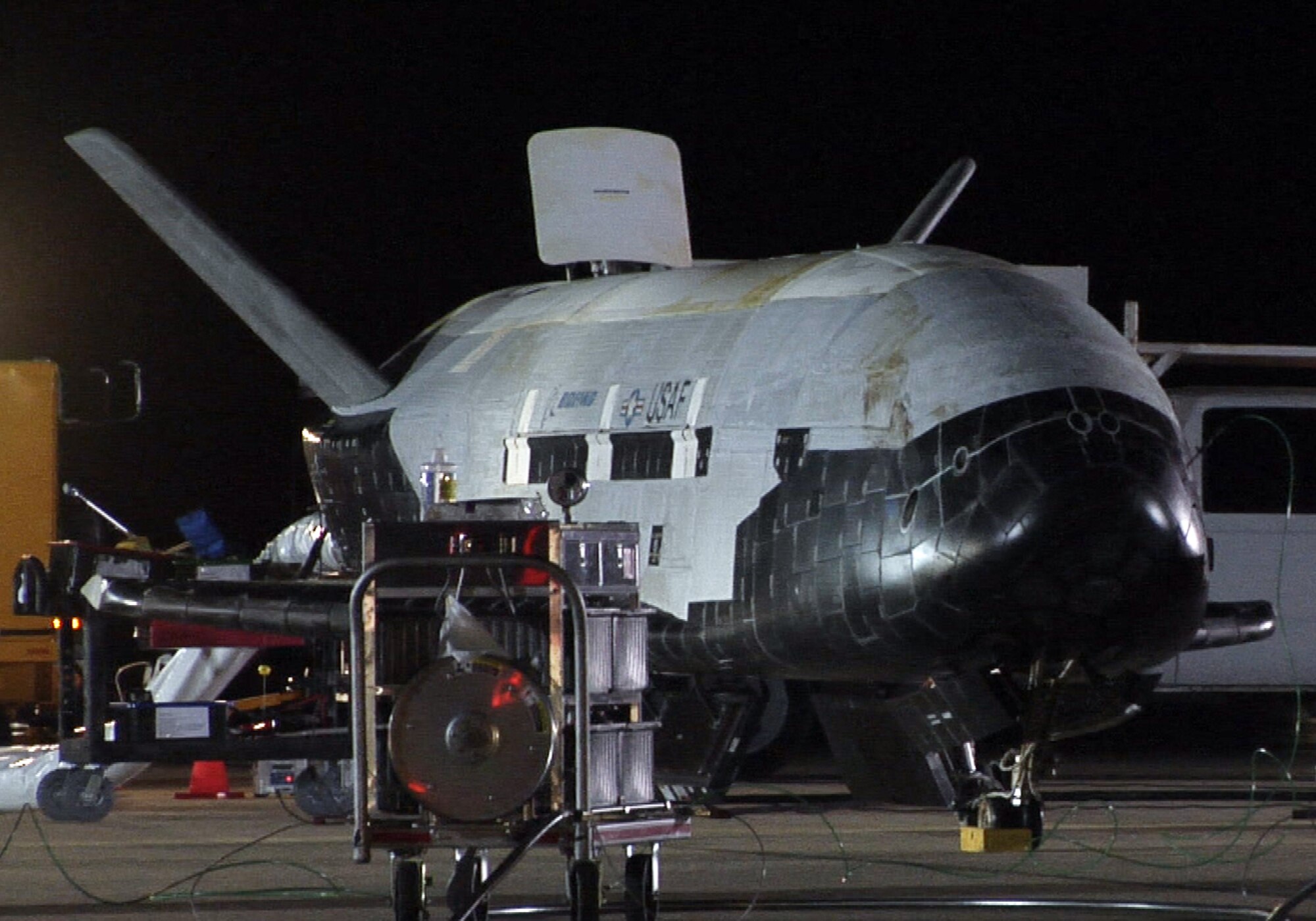 The X-37B sits on the Vandenberg Air Force base runway during post-landing operations Dec. 3. The X-37B’s de-orbit and landing mark the transition from the on-orbit demonstration phase to a refurbishment phase for the program. (U.S. Air Force photo/ Michael Stonecypher)