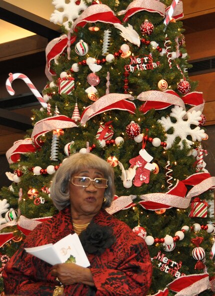 Virginia Carson addresses the Air Force Mortuary Affairs Operations team following the Christmas Tree Lighting Dec. 1, 2010. Mrs. Carson is the wife of the late Charles C. Carson, the mortuary’s namesake. She thanked the team for their hard work in support of the mission which meant a great deal to her husband and for lifting her spirits this holiday season. (U.S. Air Force photo/Staff Sgt. Jamie George)