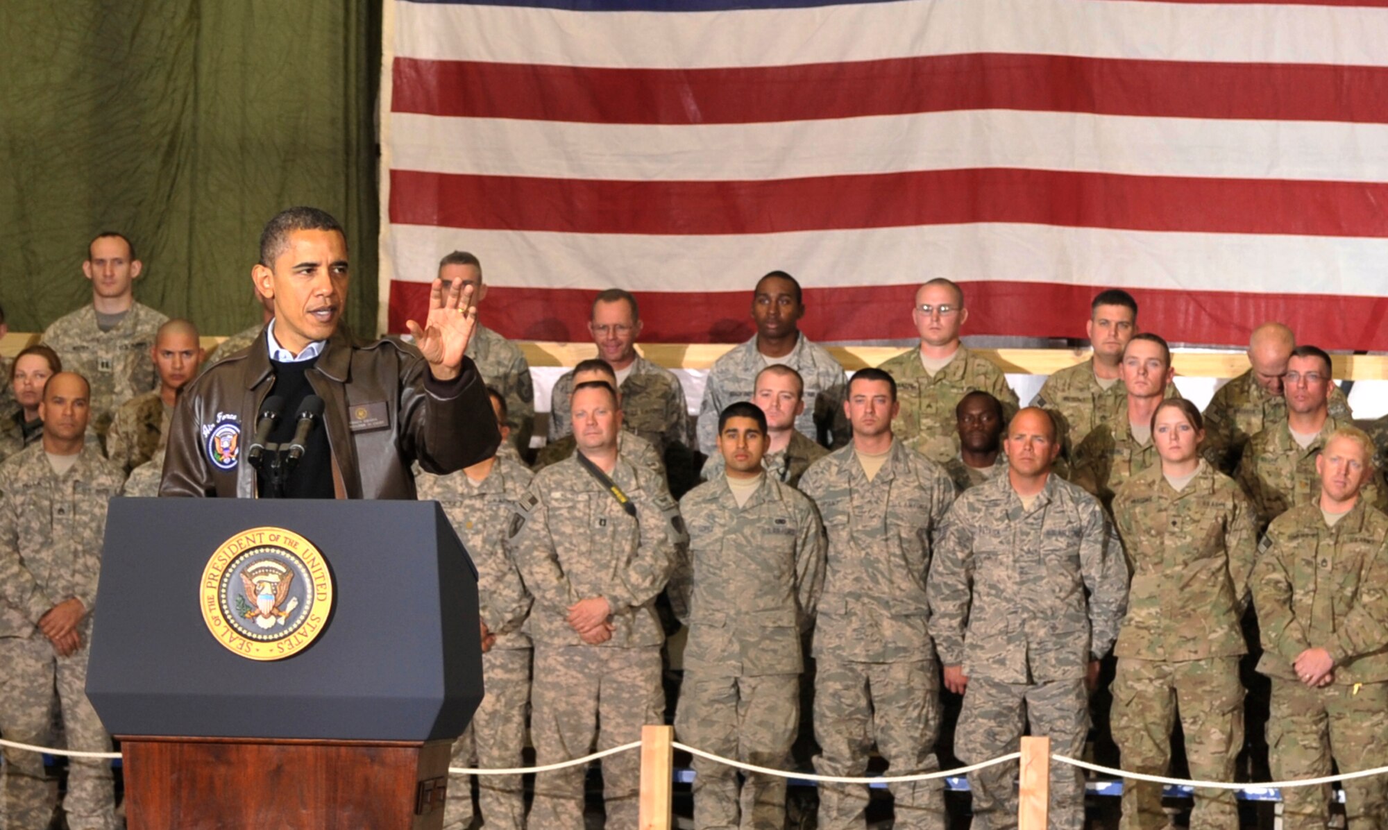 President Barack Obama spoke with Airmen, Soldiers, Sailors and Marines during a visit to Bagram Airfield, Afghanistan, Dec. 3, 2010. President Obama addressed current issues including the troop surge, pay freeze and extended his appreciation to the men and women of the armed forces serving around the world. (U.S. Air Force photo/Staff Sgt. Christopher Boitz) 