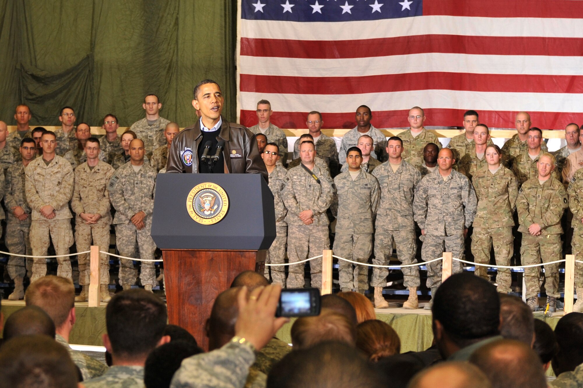 President Barack Obama spoke with Airmen, Soldiers, Sailors and Marines during a visit to Bagram Airfield, Afghanistan, Dec. 3, 2010. President Obama addressed current issues including the troop surge, pay freeze and extended his appreciation to the men and women of the armed forces serving around the world. (U.S. Air Force photo/Staff Sgt. Christopher Boitz) 