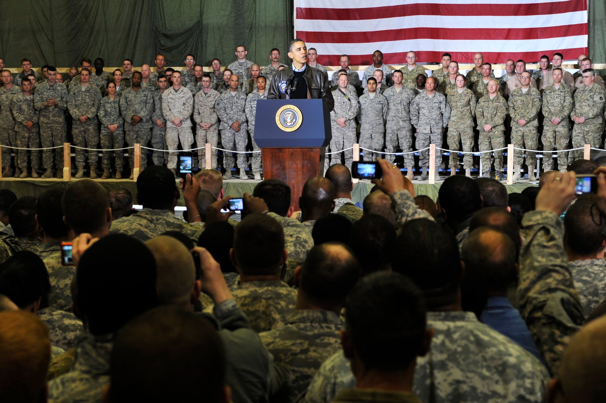 President Barack Obama spoke with Airmen, Soldiers, Sailors and Marines during a visit to Bagram Airfield, Afghanistan, Dec. 3, 2010. President Obama addressed current issues including the troop surge, pay freeze and extended his appreciation to the men and women of the armed forces serving around the world. (U.S. Air Force photo/Staff Sgt. Christopher Boitz) 