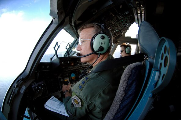 Lt. Gen. Herbert "Hawk" Carlisle, 13th Air Force commander, takes in the view of the Hawaiian Islands Nov. 30 during during his final flight as 13th AF commander. General Carlisle's final flight was supported by the 15th Wing's 535th Airlift Squadron here. General Carlisle has been confirmed for assignment as Deputy Chief of Staff, Operations, Plans and Requirements, Headquarters U.S. Air Force, Washington, D.C. (U.S. Air Force photo by Mark Bates)