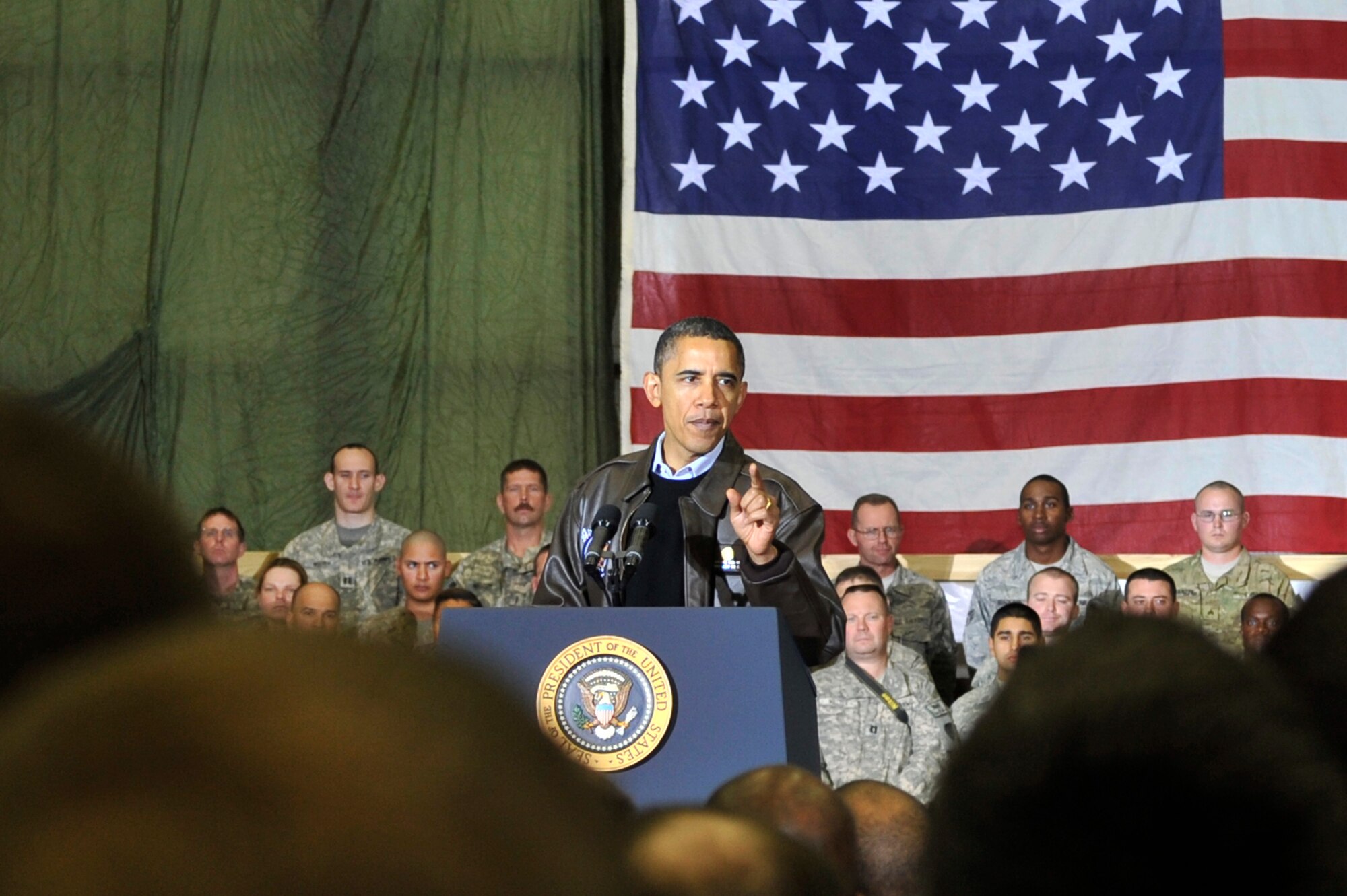 President Barack Obama spoke with Airmen, Soldiers, Sailors and Marines during a visit to Bagram Airfield, Afghanistan, Dec. 3, 2010. President Obama addressed current issues including the troop surge, pay freeze and extended his appreciation to the men and women of the armed forces serving around the world. (U.S. Air Force photo/Staff Sgt. Christopher Boitz) 
