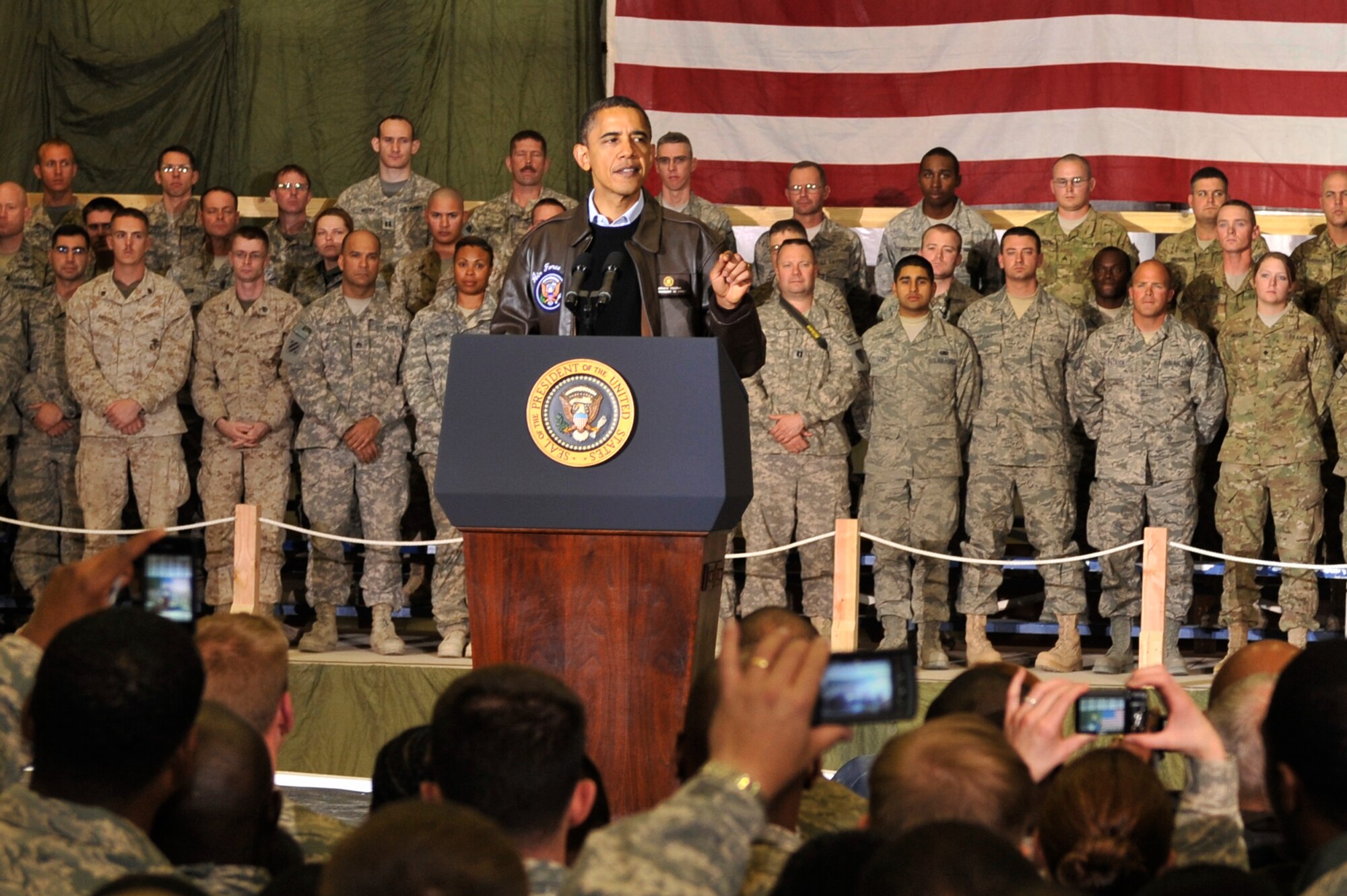 President Barack Obama spoke with Airmen, Soldiers, Sailors and Marines during a visit to Bagram Airfield, Afghanistan, Dec. 3, 2010. President Obama addressed current issues including the troop surge, pay freeze and extended his appreciation to the men and women of the armed forces serving around the world. (U.S. Air Force photo/Staff Sgt. Christopher Boitz) 