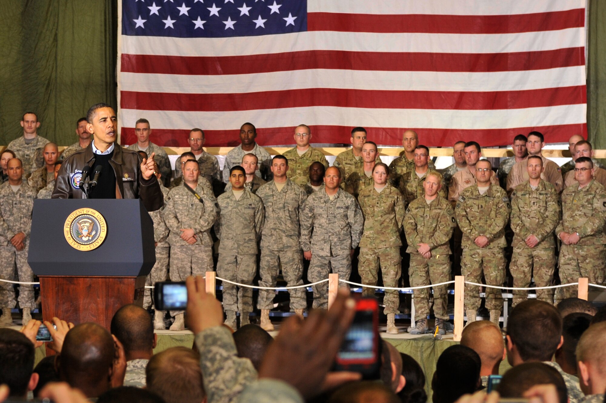 President Barack Obama spoke with Airmen, Soldiers, Sailors and Marines during a visit to Bagram Airfield, Afghanistan, Dec. 3, 2010. President Obama addressed current issues including the troop surge, pay freeze and extended his appreciation to the men and women of the armed forces serving around the world. (U.S. Air Force photo/Staff Sgt. Christopher Boitz) 