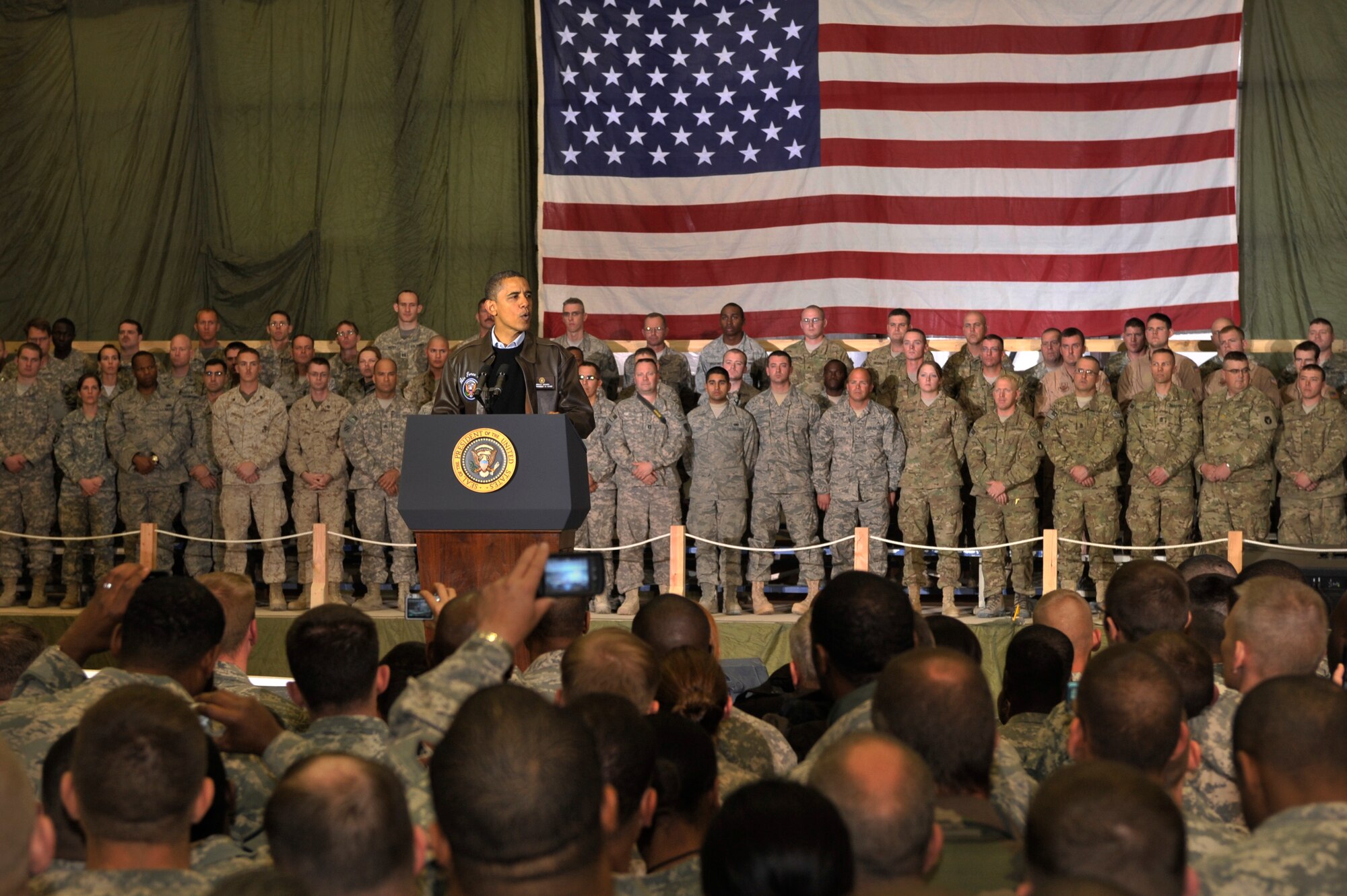 President Barack Obama spoke with Airmen, Soldiers, Sailors and Marines during a visit to Bagram Airfield, Afghanistan, Dec. 3, 2010. President Obama addressed current issues including the troop surge, pay freeze and extended his appreciation to the men and women of the armed forces serving around the world. (U.S. Air Force photo/Staff Sgt. Christopher Boitz) 