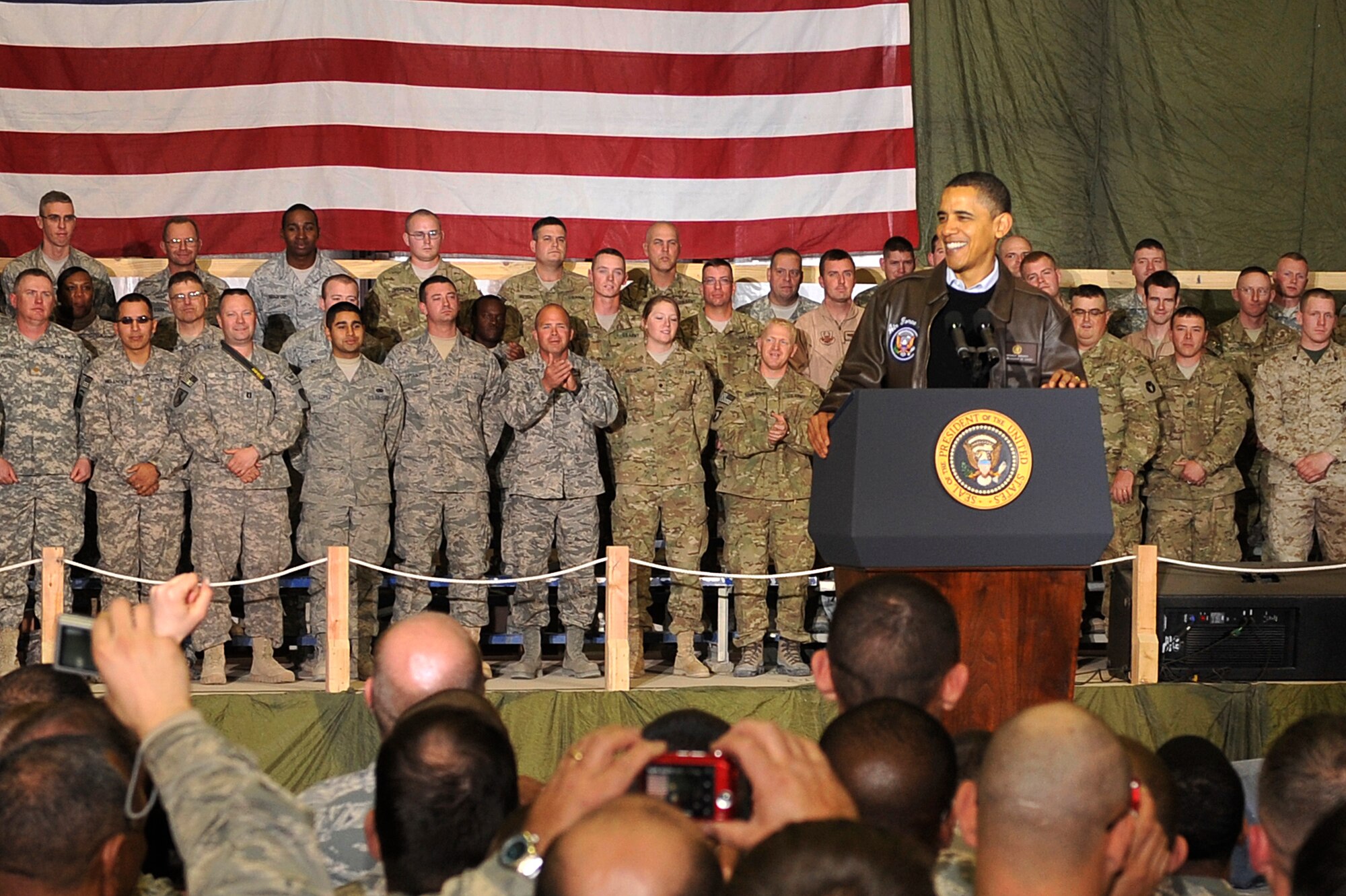President Barack Obama spoke with Airmen, Soldiers, Sailors and Marines during a visit to Bagram Airfield, Afghanistan, Dec. 3, 2010. President Obama addressed current issues including the troop surge, pay freeze and extended his appreciation to the men and women of the armed forces serving around the world. (U.S. Air Force photo/Staff Sgt. Christopher Boitz) 