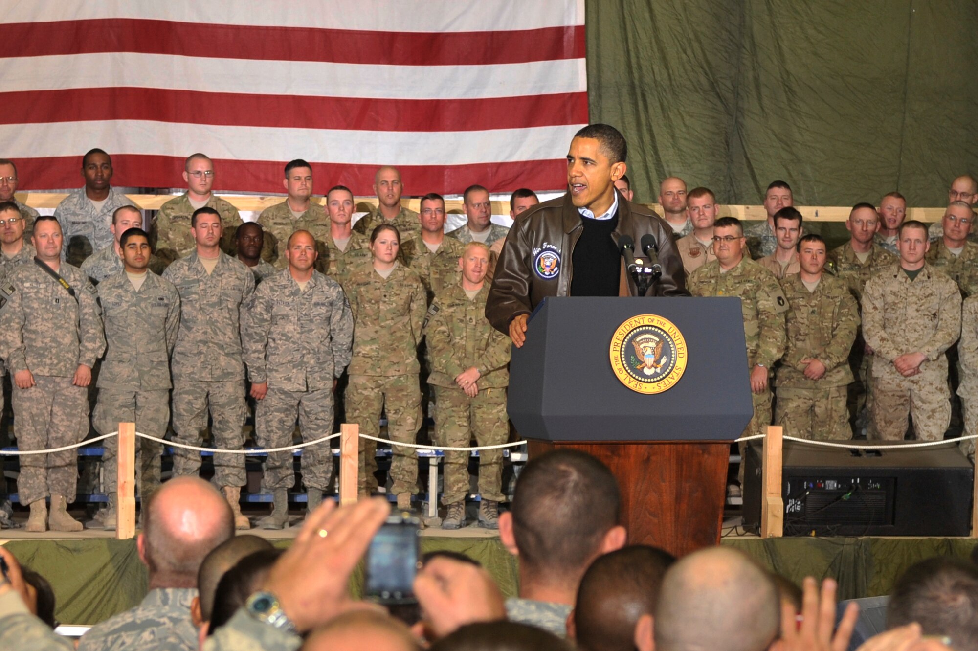 President Barack Obama spoke with Airmen, Soldiers, Sailors and Marines during a visit to Bagram Airfield, Afghanistan, Dec. 3, 2010. President Obama addressed current issues including the troop surge, pay freeze and extended his appreciation to the men and women of the armed forces serving around the world. (U.S. Air Force photo/Staff Sgt. Christopher Boitz) 