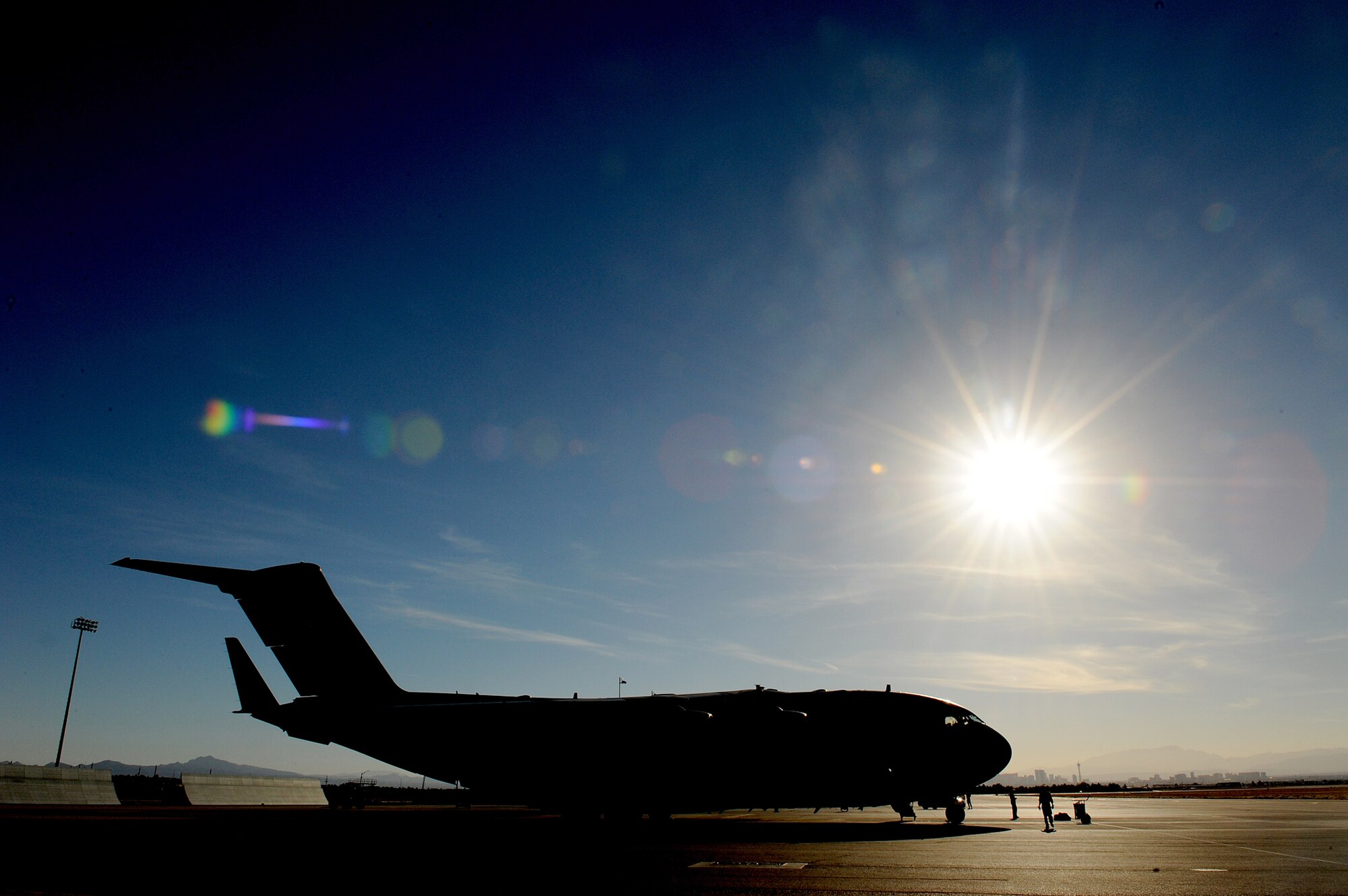 A 535th Airlift Squadron C-17 Globemaster III arrives at the conclusion of the Mobility Air Forces Exercise 10-B Nov. 18, 2010, at Nellis Air Force Base, Nev. Aircrews trained in unrestricted descent assault landings, air drop, combat offloads, air refueling, night vision goggle training, combat offloads, low levels, mountainous terrain, assault landings, threat responses and multiple ship formation training during a five-day training trip to Washington Nov. 12 to 17 leading up to the MAFEX. (U.S. Air Force photo/Staff Sgt. Mike Meares)