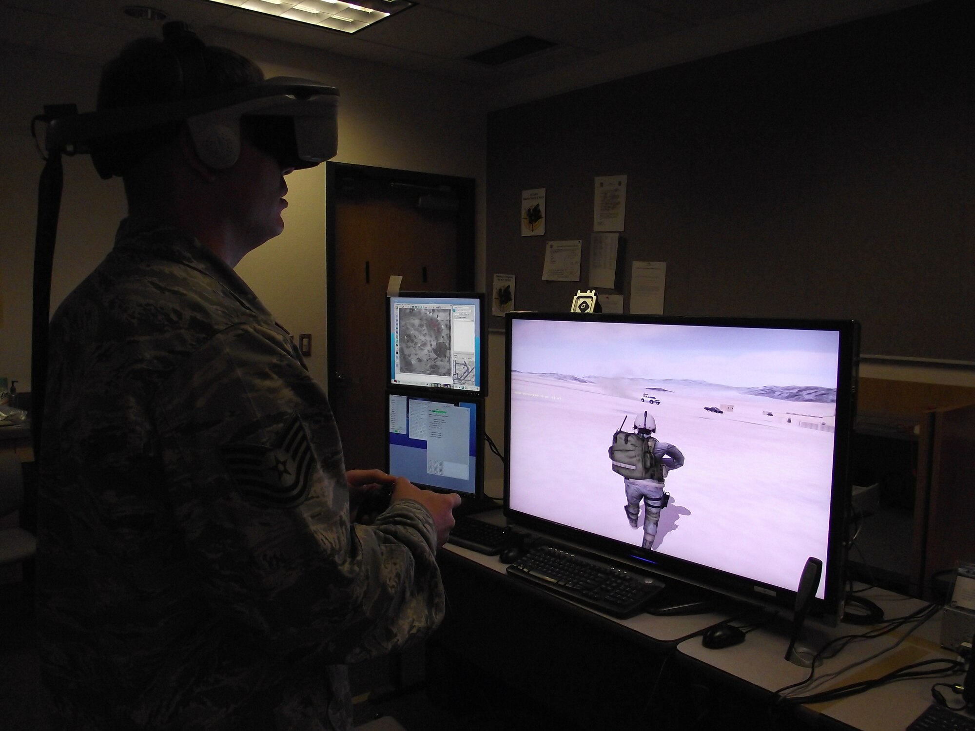 Tech. Sgt. Ryan Fausey, 682nd Air Support Operations Squadron, demonstrates the Distributed Mission Operations Center Radio Emulator.  U.S. Air Force Photo By Stefan Bocchino.