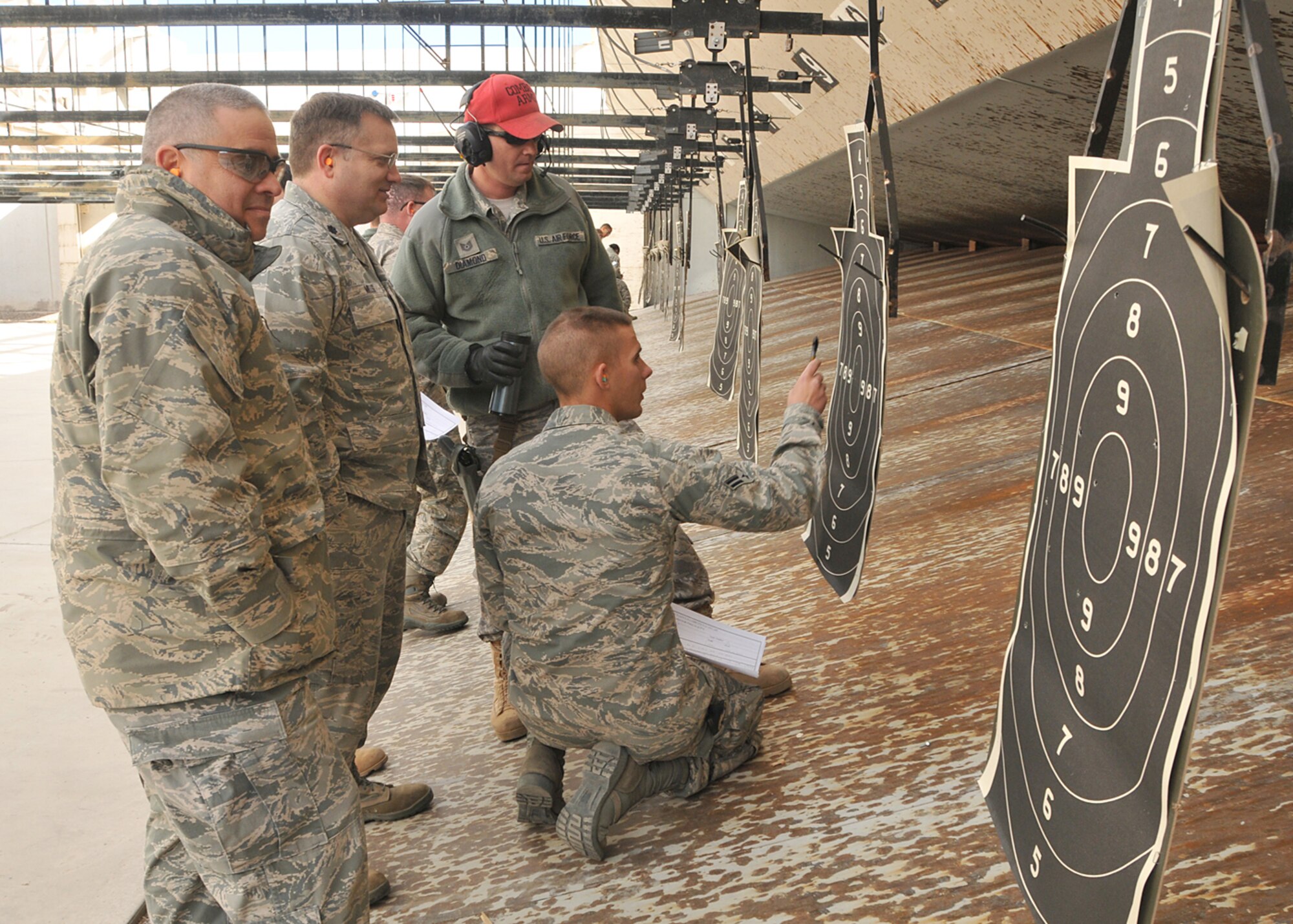 Competitors move down range to check their scores.  U.S. Air Force Photo by Todd Berenger.