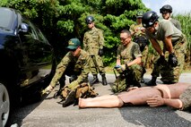 Japan Self-Defense Forces Senior Master Sgt. Shingo Fujiki a pararescue lowers a lift bag after pulling out a simulated victim during vehicle extraction training Dec. 3. The extraction training was part of Keen Sword to bring together United States Air Force and Japan Self-Defense Forces pararescue men to train and share techniques on vehicle extraction. Keen Sword is a regularly scheduled exercise that strengthens Japan-U.S. military interoperability and meets mutual defense objectives. Japan-U.S. military operations and exercises increase readiness to respond to varied crisis situations.(U.S. Air Force photo/Staff Sgt. Jonathan Steffen) 