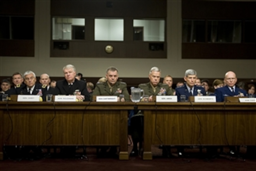 Army Chief of Staff Gen. George W. Casey Jr. (left), Chief of Naval Operations Adm. Gary Roughead, Vice Chairman of the Joint Chiefs of Staff Gen. James Cartwright, Marine Corps Commandant Gen. James Amos, Air Force Chief of Staff Gen. Norton Schwartz and Coast Guard Commandant Adm. Robert Papp Jr. (right) testify on Capitol Hill in Washington, D.C., before the Senate Armed Service Committee's hearing on the military "don't ask, don't tell" policy on Dec. 3, 2010.  