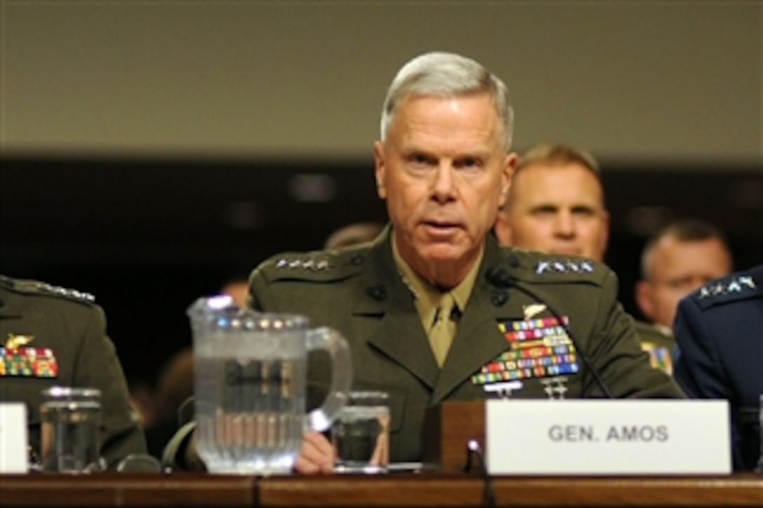 Marine Corps Commandant Gen. James Amos testifies on Capitol Hill before the Senate Armed Services Committee's hearing on the military's "don't ask, don't tell" policy on Dec. 3, 2010.  