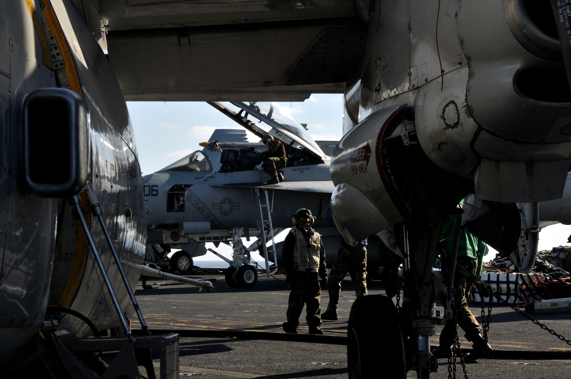 PACIFIC OCEAN -- Sailors aboard USS George Washington (CVN 73) perform last minute checks on aircraft before allowing them to be launched off the ship's flight deck during flight quarters. The GW is currently participating in Keen Sword 2011 with Japanese Self Defense Forces. This exercise enhances the Japan-U.S. alliance which remains a key strategic relationship in the Northeast Asia Pacific region. Keen Sword caps the 50th anniversary of the Japan-U.S. alliance as an "alliance of equals." The exercise runs through Dec. 10. (U.S. Navy photo by Mass Communication Specialist 3rd Class David A. Cox)