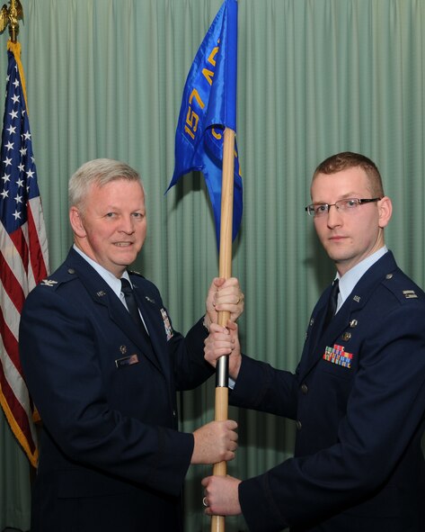 Col. Paul Hutchinson, 157th Air Refueling Wing Commander, and Capt. Scott Treadwell, Comptroller, pose for a photo during the 157th Comptroller Flight activation and assumption of command ceremony at Pease Air National Guard Base, New Hampshire on Dec. 4, 2010. (U.S. Air Force photo/Staff Sgt. Curtis J. Lenz)