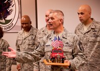 Newly inducted Chief Master Sgt. James Roberts, 919th Maintenance Group,  addresses the audience as the 919th Special Operations Wing’s newest “jeep chief” during his ceremony Dec. 4 at Duke Field.  The “jeep chief” must keep the jeep trophy with them at all times while on duty or “pay” the consequences from the chief’s group.  (U.S. Air Force photo/Tech Sgt. Samuel King Jr.)
