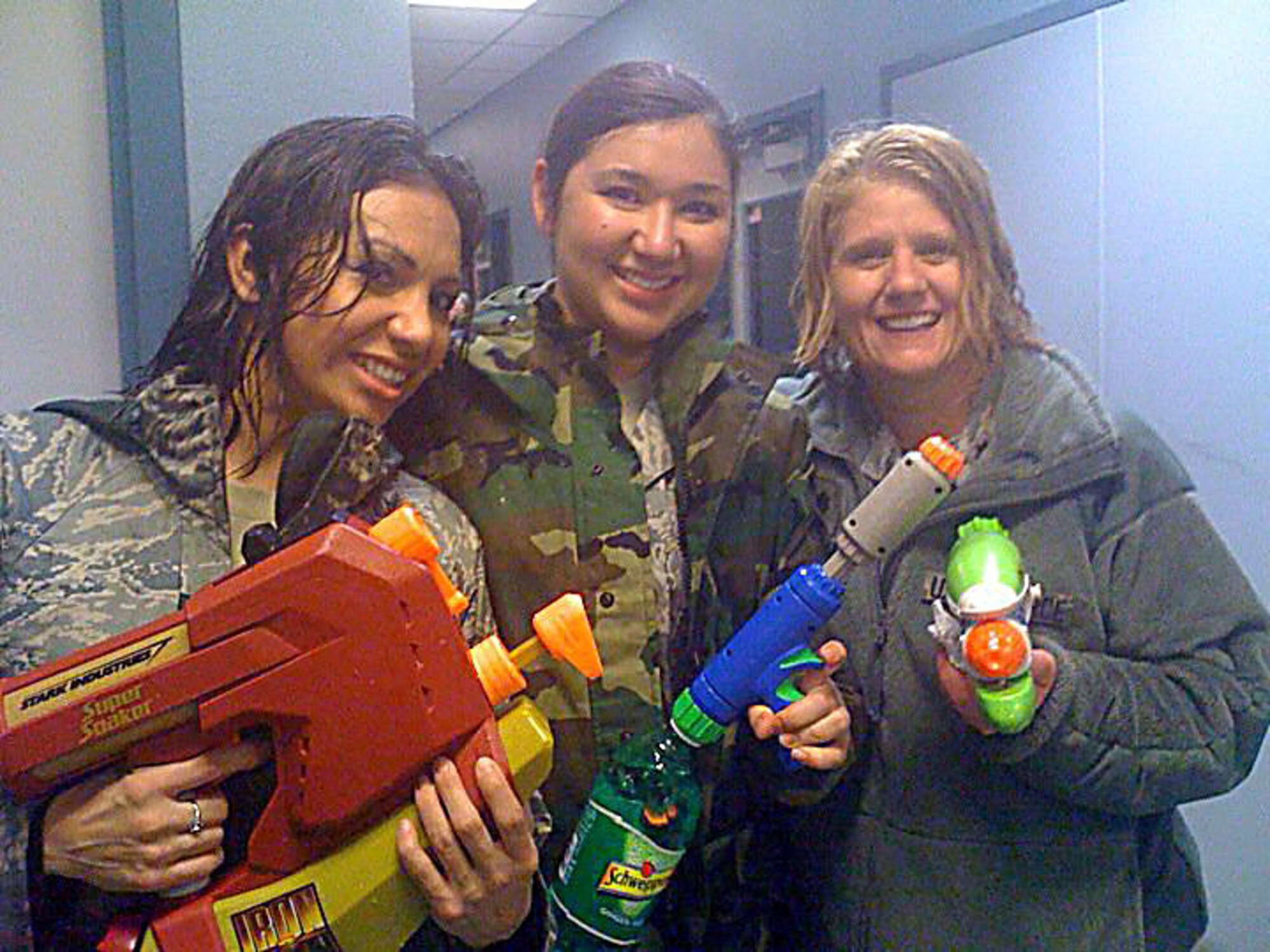 KULIS AIR NATIONAL GUARD BASE, Alaska -- 2nd. Lt. Vanessa Ortiz, 2nd Lt. Charity Mollison, and Lt. Col. Patty Wilbanks at the 176th Wing's final "Combat Dining In" at Kulis Air National Guard Base. Photographer unknown.