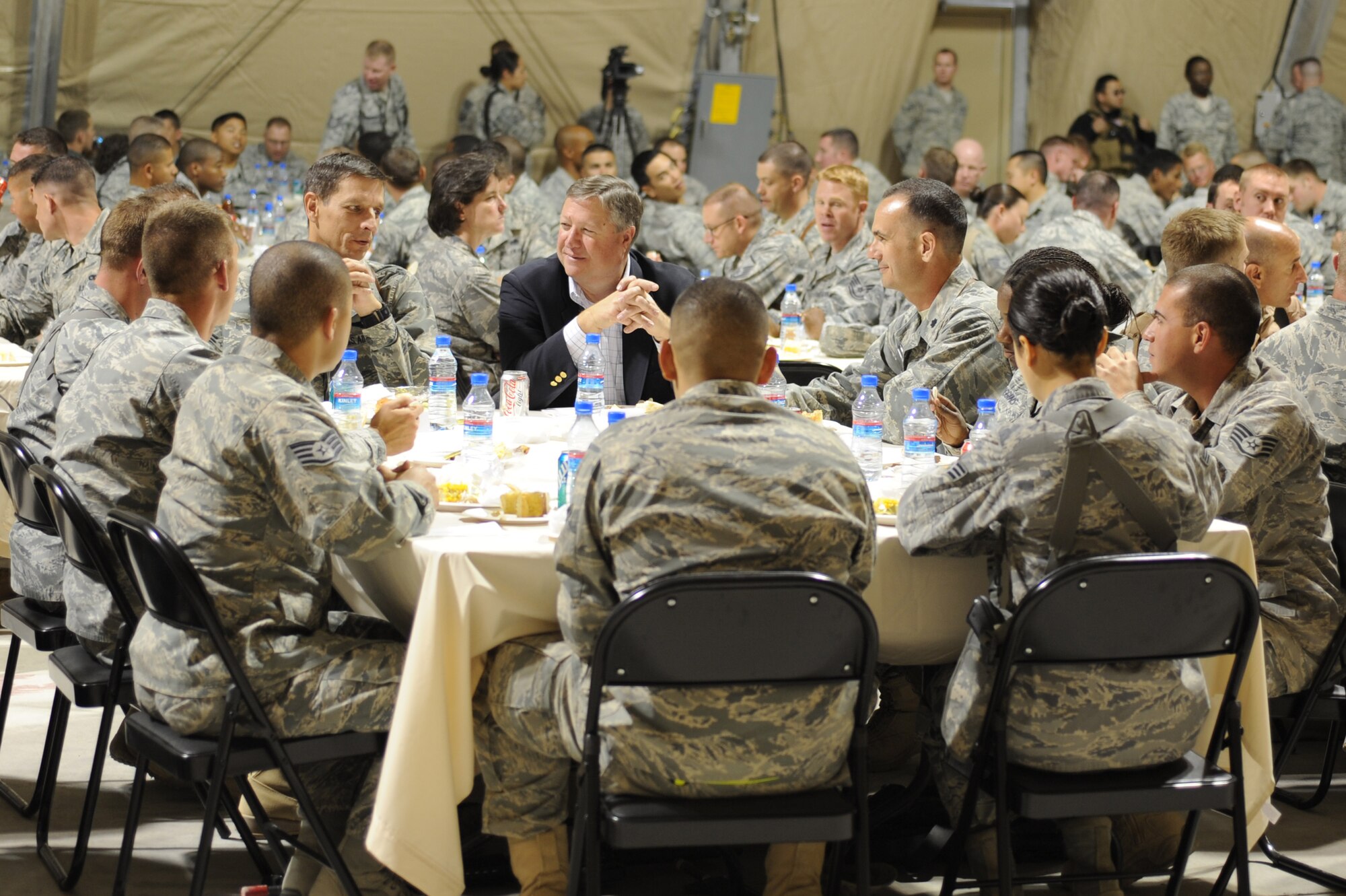 Brig. Gen. Paul Johnson and Secretary of the Air Force Michael Donley speak during an Airman’s Call luncheon Nov. 27, 2010, at Kandahar Airfield, Afghanistan. Secretary Donley and Chief Master Sgt. of The Air Force James Roy visited numerous bases throughout southwest Asia thanking Airmen for their service through the holidays. General Johnson is the commander of the 451st Air Expeditionary Wing. (U.S. Air Force photo by Tech. Sgt. Chad Chisholm/Released)