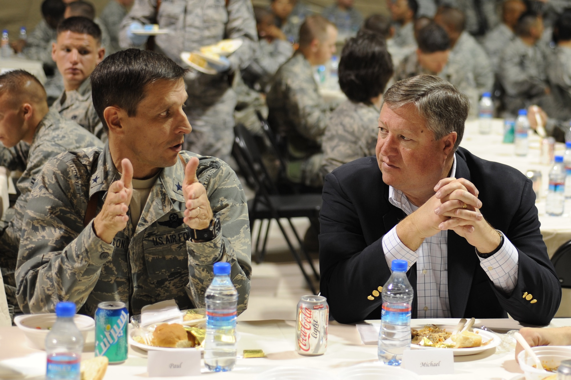 Brig. Gen. Paul Johnson and Secretary of the Air Force Michael Donley speak during an Airman’s Call luncheon Nov. 27, 2010, at Kandahar Airfield, Afghanistan. Secretary Donley and Chief Master Sgt. of The Air Force James Roy visited numerous bases throughout southwest Asia thanking Airmen for their service through the holidays. General Johnson is the commander of the 451st Air Expeditionary Wing. (U.S. Air Force photo by Tech. Sgt. Chad Chisholm/Released)