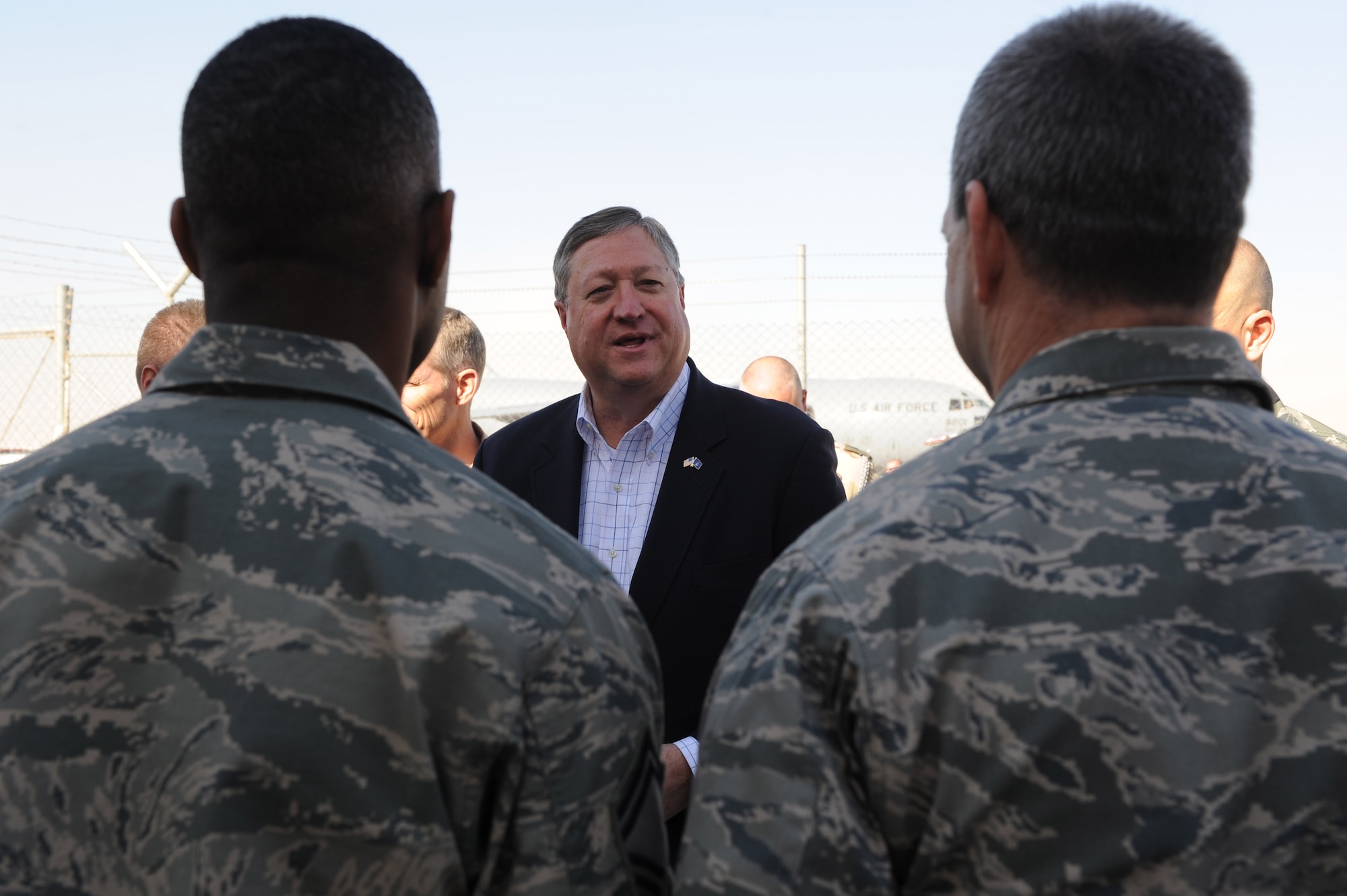 Secretary of the Air Force Michael Donley answers an Airman’s question Nov. 27, 2010, at Kandahar Airfield, Afghanistan. Secretary Donley and Chief Master Sgt. of The Air Force James Roy visited numerous bases throughout southwest Asia thanking Airmen for their service through the holidays. (U.S. Air Force photo by Tech. Sgt. Chad Chisholm/Released)