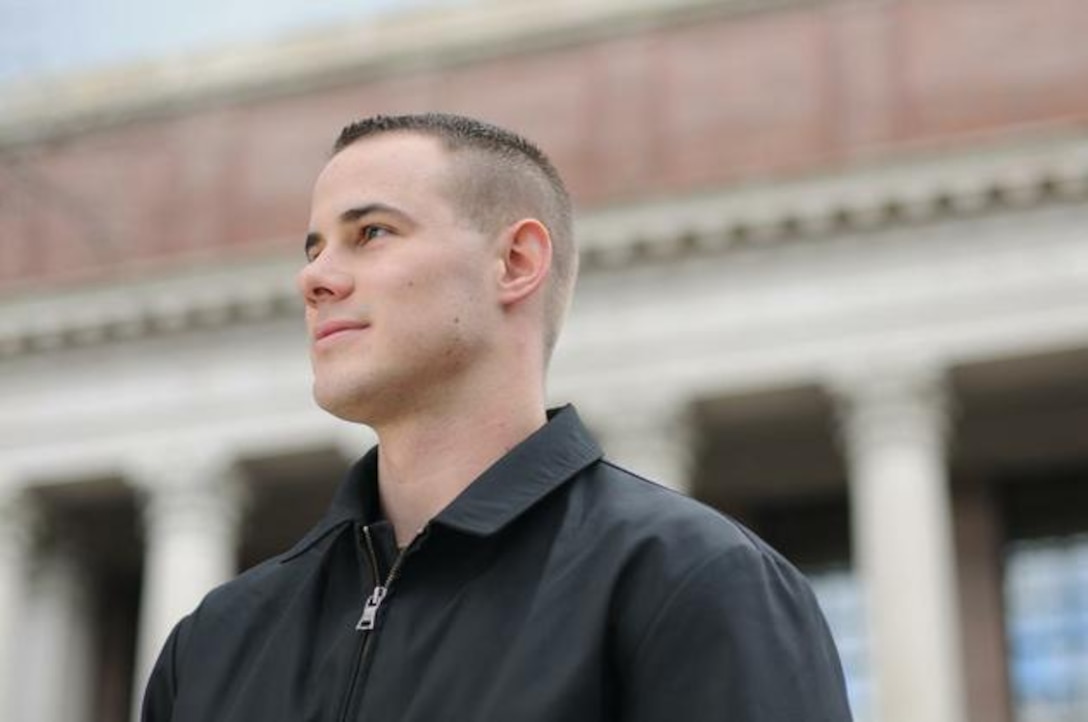An atypical Harvard freshman, Marine Corps veteran Taylor B. Evans ’14 lives off-campus with his wife and daughter and must fulfill military obligations in addition to attending class and completing homework. (Photo by Meredith H. Keffer)::r::::n::