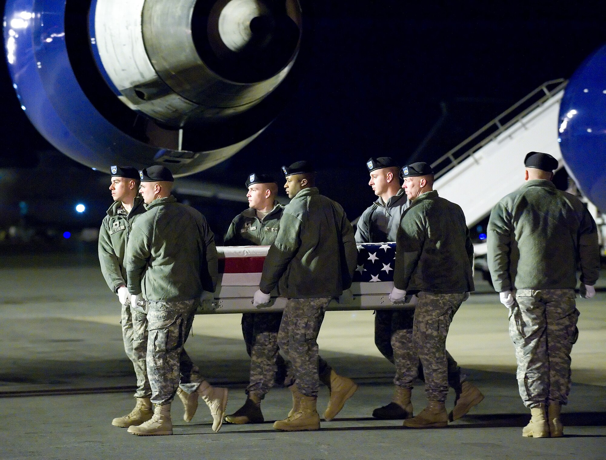 A U.S. Army carry team transfers the remains of Army Sgt. Vincent W. Ashlock of Seaside, Ca., at Dover Air Force Base, Del., Dec. 5, 2010.  (U.S. Air Force photo by Jason Minto)