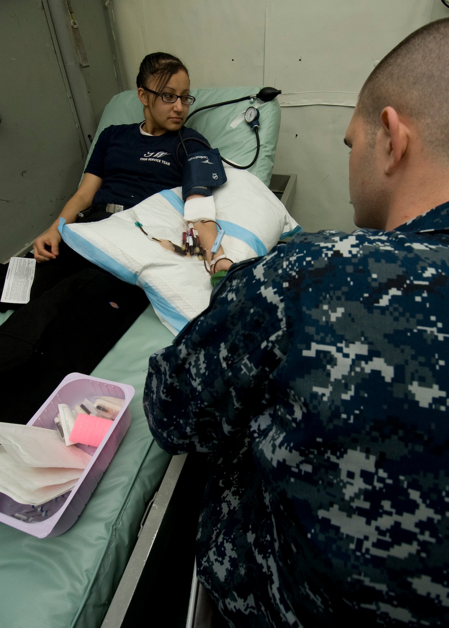 Aviation Ordnanceman Airman Amanda Longie from Busey, Mont. donates blood aboard USS George Washington (CVN 73) to the Armed Services  Blood Bank Center in the Pacific Ocean, on Dec. 5, 2010. This is the first ever blood drive the GW has held while underway. GW is currently participating in Keen Sword 2011 with the Japan Maritime Self Defense Force (JMSDF). This exercise enhances the Japan-U.S. alliance which remains a key strategic relationship in the Northeast Asia Pacific region. Keen Sword caps the 50th anniversary of the Japan-U.S. alliance as an "alliance of equals." The exercise runs through Dec. 10. (U.S. Navy photo by Mass Communication Specialist Seaman Cheng S. Yang)