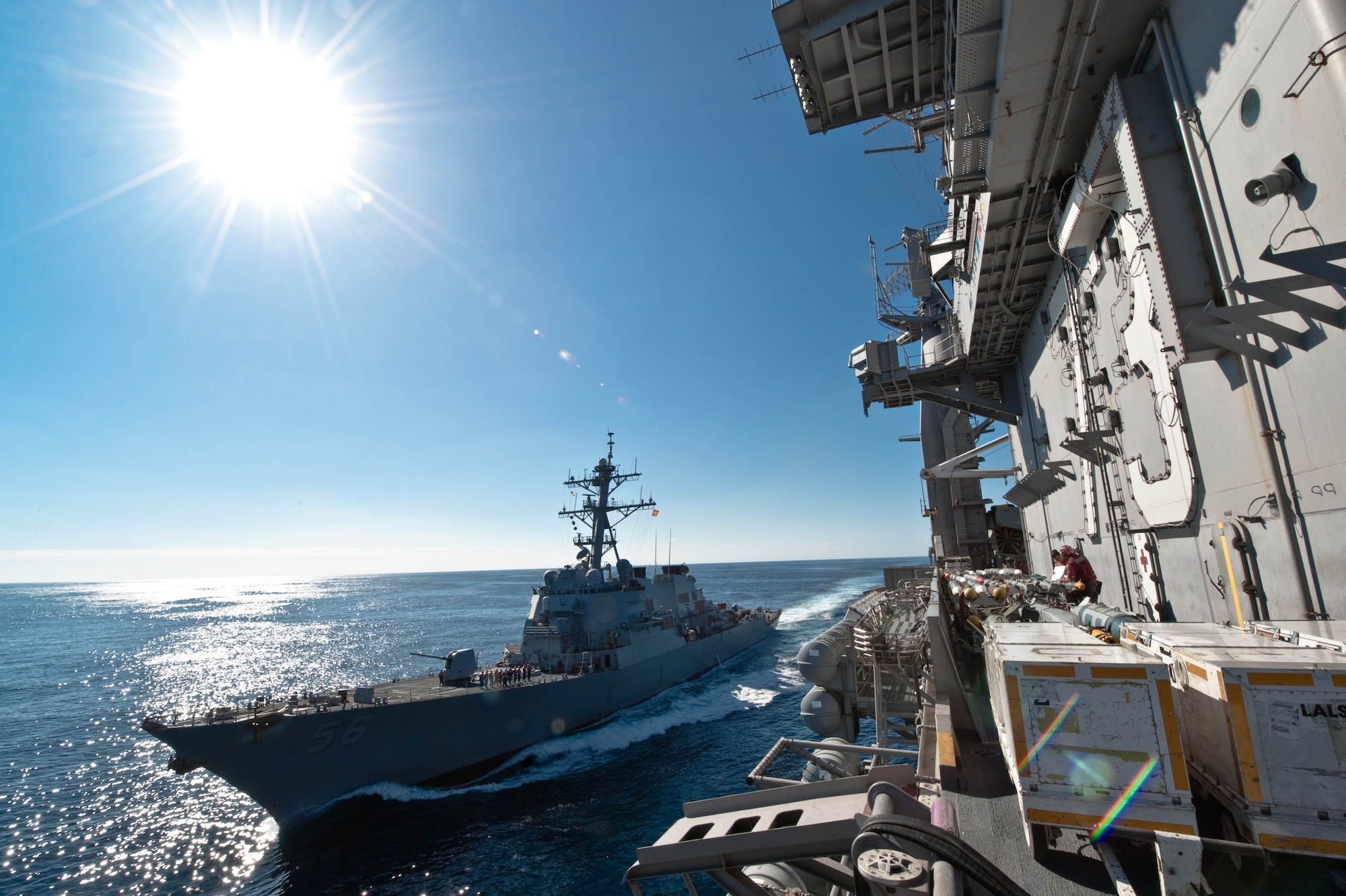 The U.S. Navy destroyer class cruiser, USS John McCain (DDG 56), pulls alongside USS George Washington to refuel at sea in the Pacific Ocean on Dec. 5, 2010. USS George Washington is currently participating in Keen Sword 2011 with the Japan Maritime Self Defense Force. This exercise enhances the Japan-U.S. alliance which remains a key strategic relationship in the Northeast Asia Pacific region. Keen Sword caps the 50th anniversary of the Japan-U.S. alliance as an "alliance of equals." The exercise runs through Dec. 10. (U.S. Navy photo by Mass Communication Specialist 3rd Class Juan Pinalez)
 