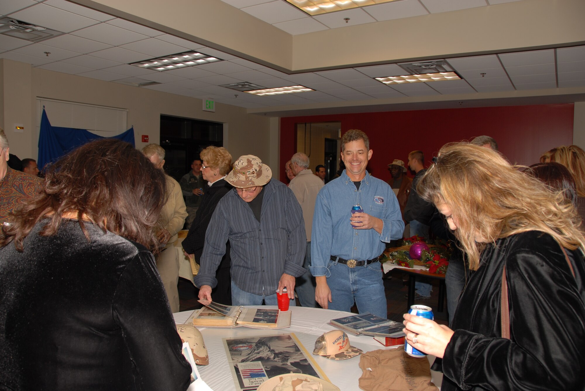Former members of the 164th Aerial Port Squadron gather and share memories at their 20 year Desert Storm Deployment Reunion.