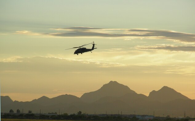 DAVIS-MONTHAN AIR FORCE BASE, Ariz. - Air Force Reserve Airmen from the 920th Rescue Wing, Patrick Air Force Base, Fla., as well as from its geographically separated unit, the 943rd Rescue Group here, are featured for their heroics in a newly released documentary titled, "The Taliban Gambit," which will be airing on the Smithsonian Channel throughout December 2010.  Shown here, the film crew, shot various scenes in the Tuscon desert in July 2008 partly because the terrain replicated that of Afghanistan's the best. (U.S. Air Force photo/Capt. Cathleen Snow)
