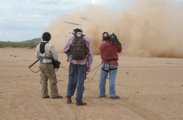 DAVIS-MONTHAN AIR FORCE BASE, Ariz. - Air Force Reserve Airmen from the 920th Rescue Wing, Patrick Air Force Base, Fla., as well as from its geographically separated unit, the 943rd Rescue Group here, are featured for their heroics in a newly released documentary titled, "The Taliban Gambit," which will be airing on the Smithsonian Channel throughout December 2010.  Shown here, the London-based Windfall Film crew, film various scenes in the Tuscon desert in July 2008. (U.S. Air Force photo/Capt. Cathleen Snow) 