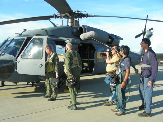 DAVIS-MONTHAN AIR FORCE BASE, Ariz. - Air Force Reserve Airmen from the 920th Rescue Wing, Patrick Air Force Base, Fla., as well as from their geographically separated unit, the 943rd Rescue Group here, are featured for their heroics in a newly released documentary titled, "The Taliban Gambit," which will be airing on the Smithsonian Channel throughout December 2010.  Shown here, the London-based Windfall Film crew, film various scenes in the Tuscon desert in July 2008. (U.S. Air Force photo/Capt. Cathleen Snow)