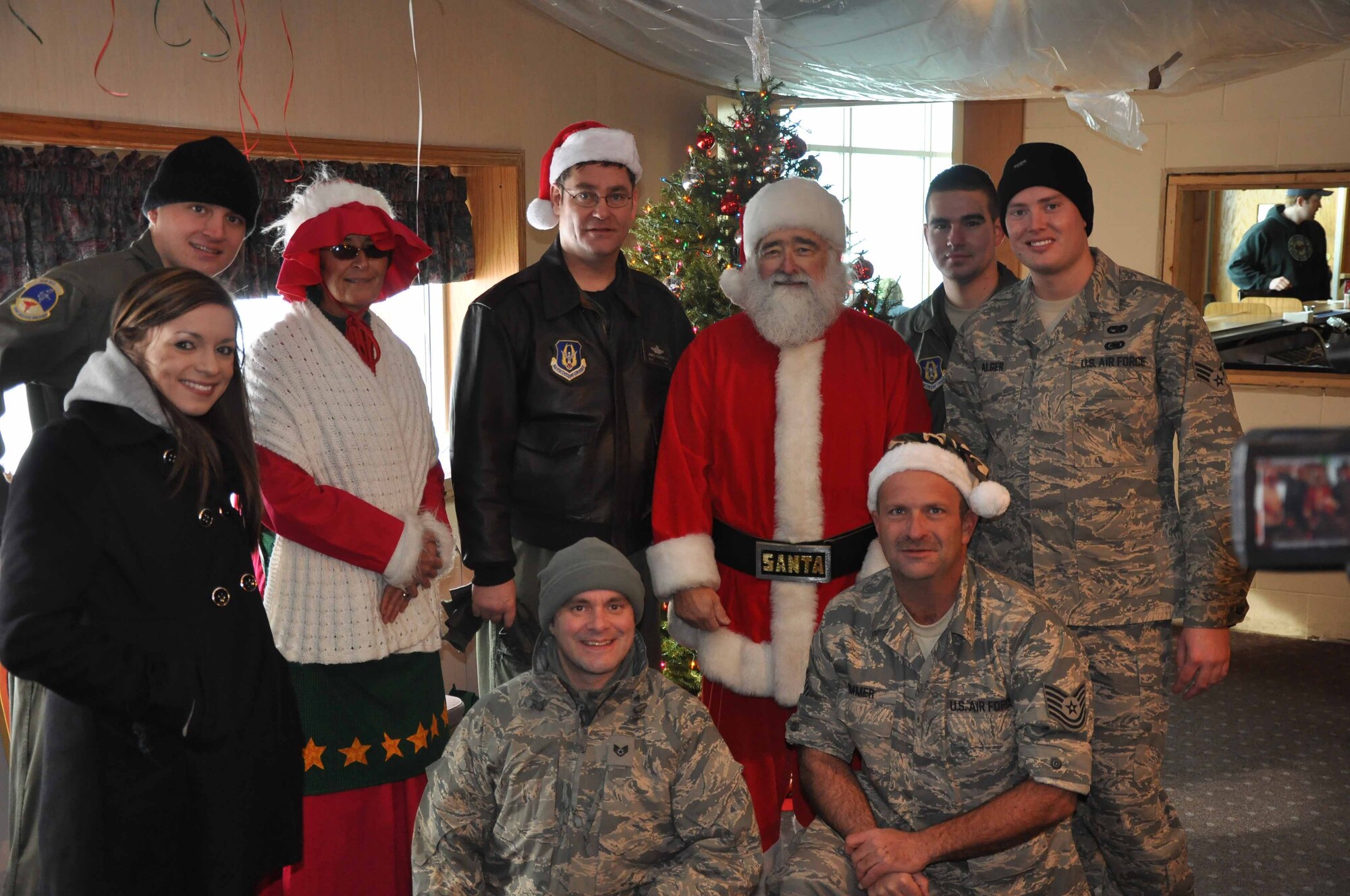 Santa and his Wingmen during Operation Santa Flight 2010, the 934th Airlift Wing along with volunteers from AT&T and the Army National Guard make it possible for people with special needs to get a trip to meet with Santa (Air Force Photo/Tech. Sgt. Bob Sommer)