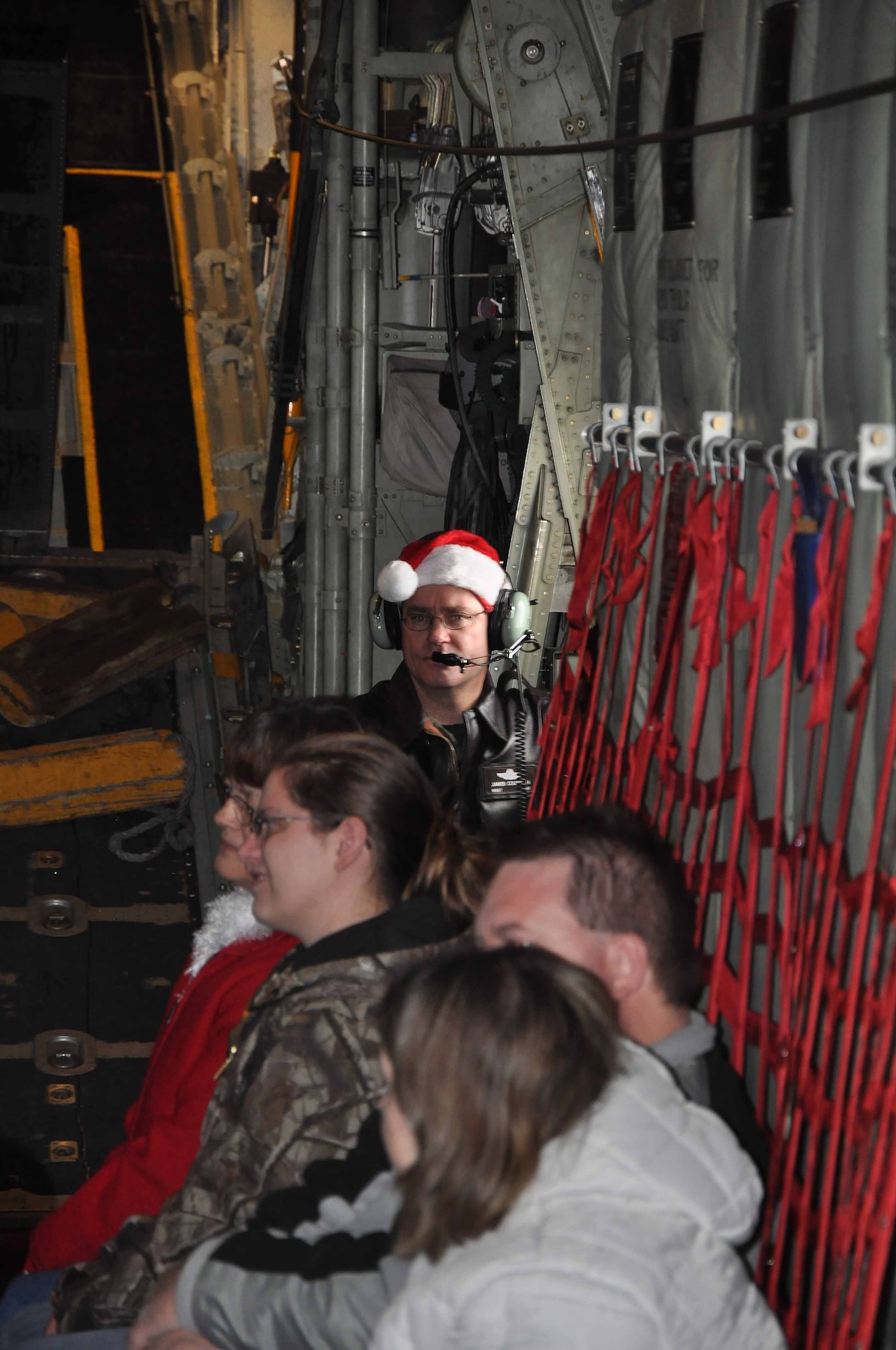 Special guests "flying" to the North Pole on a 934th Airlift Wing C130 during Operation Santa Flight 2010, the 934th Airlift Wing along with volunteers from AT&T and the Army National Guard make it possible for people with special needs to get a trip to meet with Santa (Air Force Photo/Tech. Sgt. Bob Sommer)