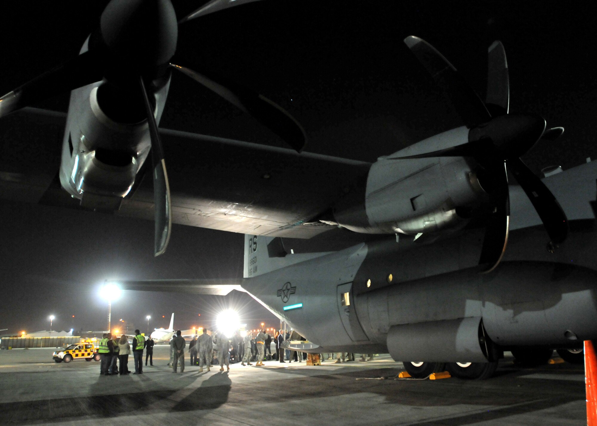 Government officials and members of the international press welcome the arrival of a C-130J Super Hercules at Ben Gurion International Airport, Israel, Dec. 4.  The aircraft delivered Fire retardant from Ramstein Air Base, Germany as part of a joint U.S. Air Forces and U.S. European Command effort to assist the Israeli government in fighting wild fires in their country. (U.S. Air Force photo by Tech. Sgt. Markus M. Maier)