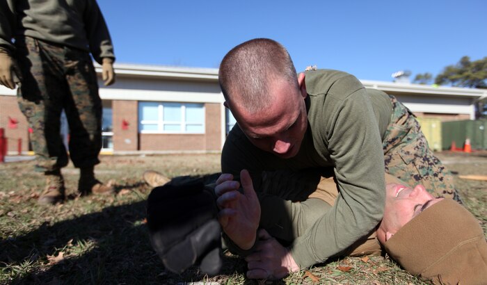 Sergeant Deryl B. Stockton, 27, Unit Movement Coordinator Non Commissioned Officer at Combat Logistics Regiment 2, 2nd Marine Logistics Group, conducts Marine Corps martial arts training, Dec. 6, 2010, aboard Camp Lejeune, N.C. Stockton has participated in three combat tours with 2nd MLG and is preparing to transfer to Marine Corps Logistics Base Albany, Ga.
