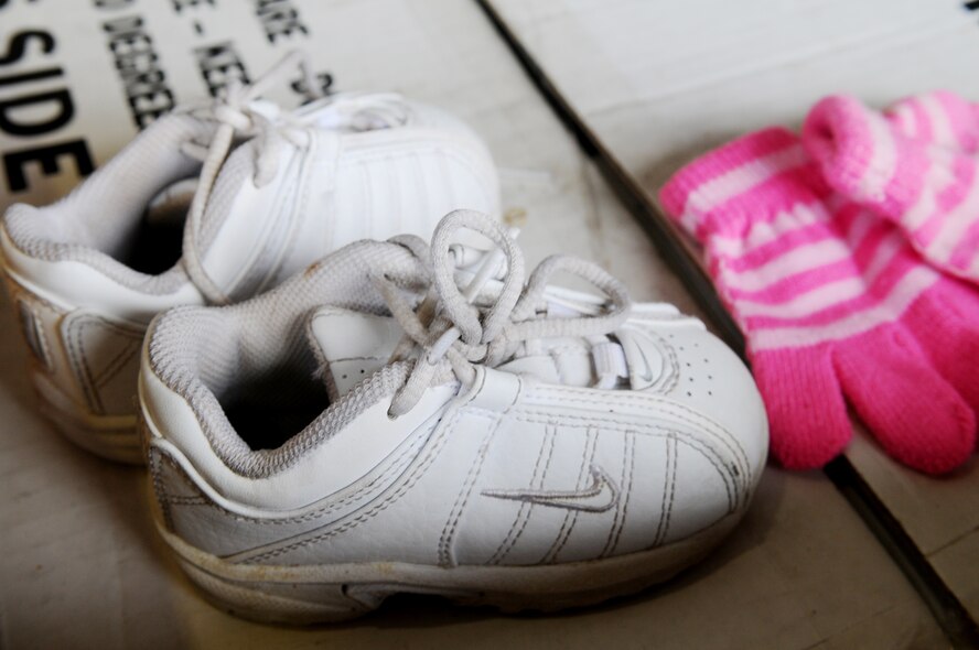 More than 57 boxes are filled with toys, cloths, first aid kits, food and supplies Dec. 4, 2010 at Andersen Air Force Base, Guam, during the Operation Christmas Drop box build. Christmas Drop is the longest running humanitarian campaign in the world marking more than five decades in operation. The concept of Operation Christmas Drop began in 1952 when locals on the island of Kapingamarangi waved to the crew of a WB-50 flying overhead. In the spirit of the holiday season, the crew gathered what they could, packed it into a canister, attached a parachute and dropped it to the islanders. (U.S. Air Force photo/ Senior Airman Nichelle Anderson)