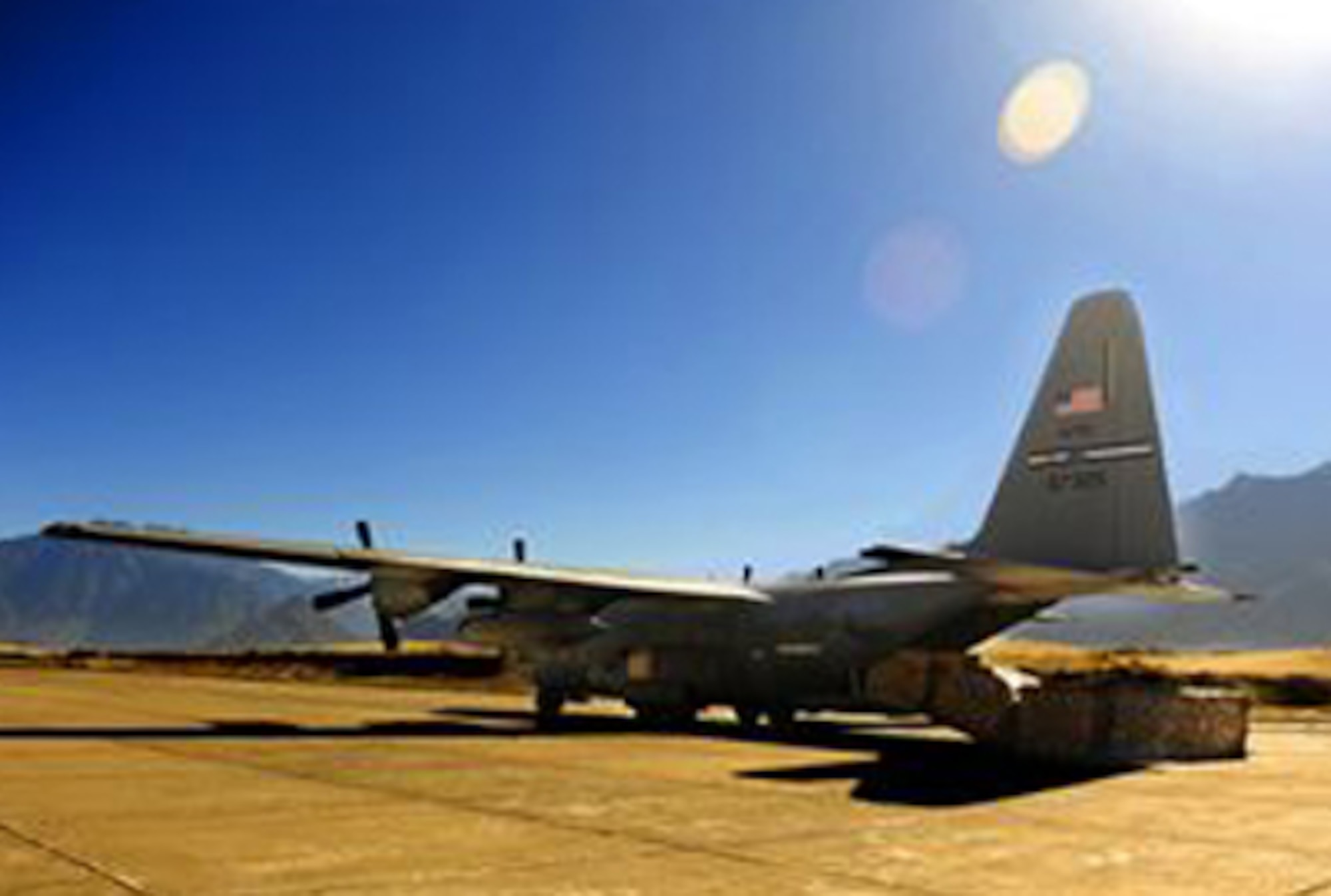 A C-130 Hercules is positioned to unload humanitarian aid supplies Oct. 3, 2010, at Skardu Airfield, Pakistan. U.S. military aircrews, worked in close coordination with the Pakistan military, transported more than 6.6 million kilograms of relief supplies and evacuated 21,000 people in the flood-affected regions of Pakistan during August and September. (U.S. Air Force photo/Staff Sgt. Andy Kin) 