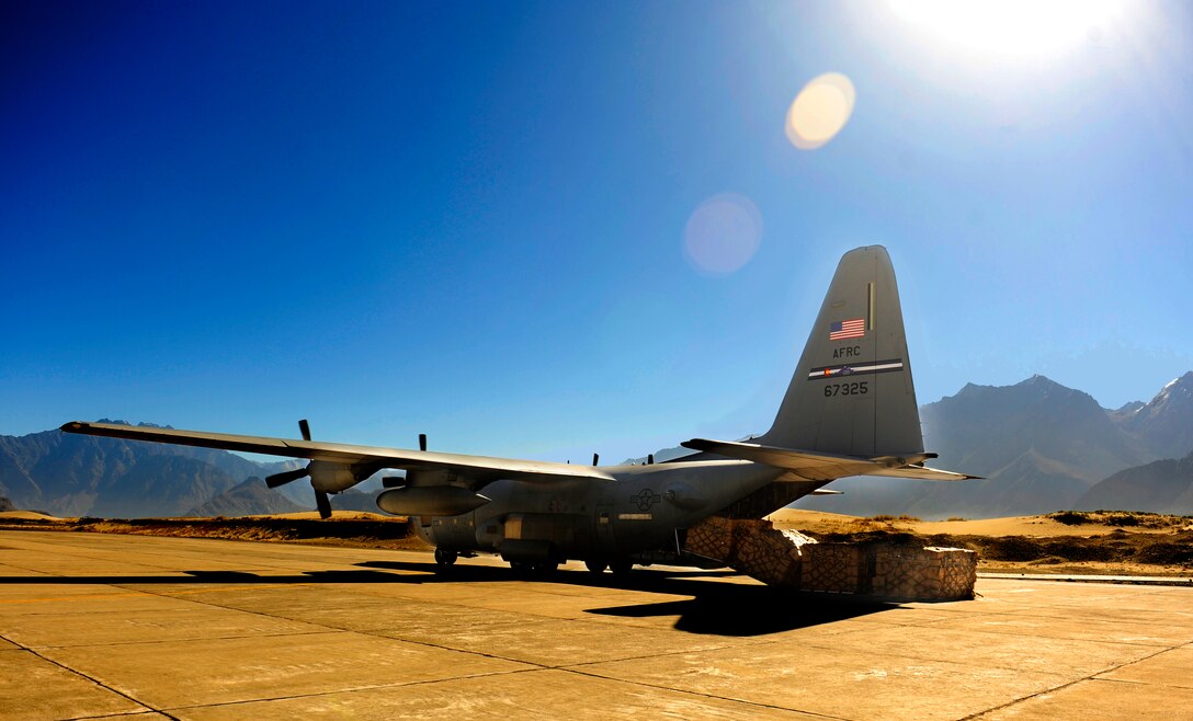 A C-130 Hercules is positioned to unload humanitarian aid supplies Oct. 3, 2010, at Skardu Airfield, Pakistan. U.S. military aircrews, worked in close coordination with the Pakistan military, transported more than 6.6 million kilograms of relief supplies and evacuated 21,000 people in the flood-affected regions of Pakistan during August and September. (U.S. Air Force photo/Staff Sgt. Andy Kin) 
