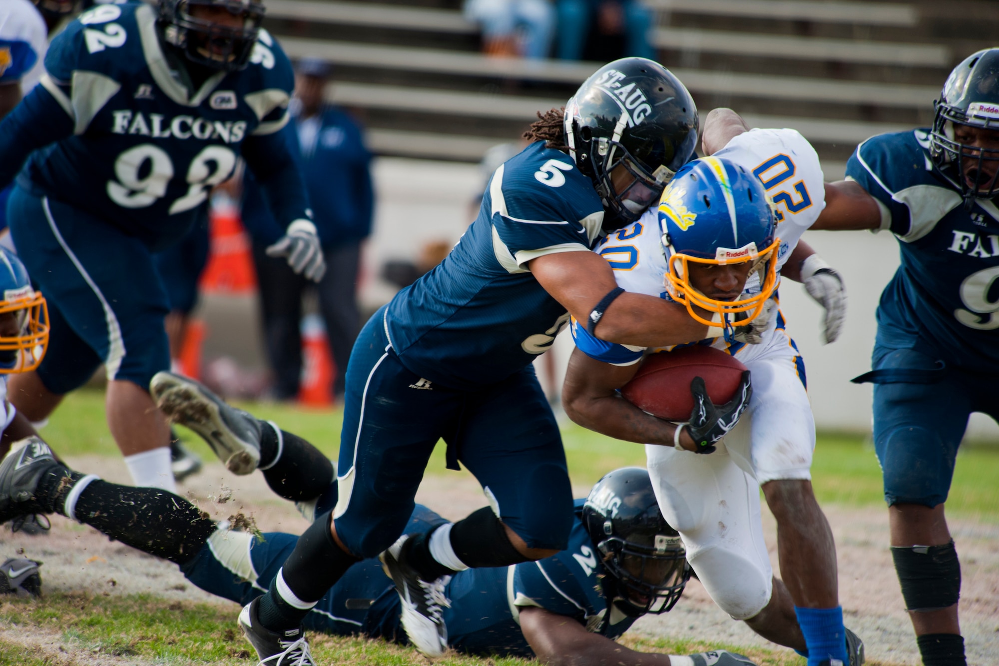 COLUMBUS, Ga. -- Mark Hall, St. Augustine's College Falcons linebacker, tackles Billy Mallard Jr., Fort Valley State University Wildcats running back, during the 2010 Pioneer Bowl Dec. 4 at the A.J. McClung Memorial Stadium. Mr. Hall completed two unassisted tackles and four assisted tackles to help the Falcons beat the Wildcats 20-9. (U.S. Air Force photo/Senior Airman Jamal D. Sutter)(RELEASED)