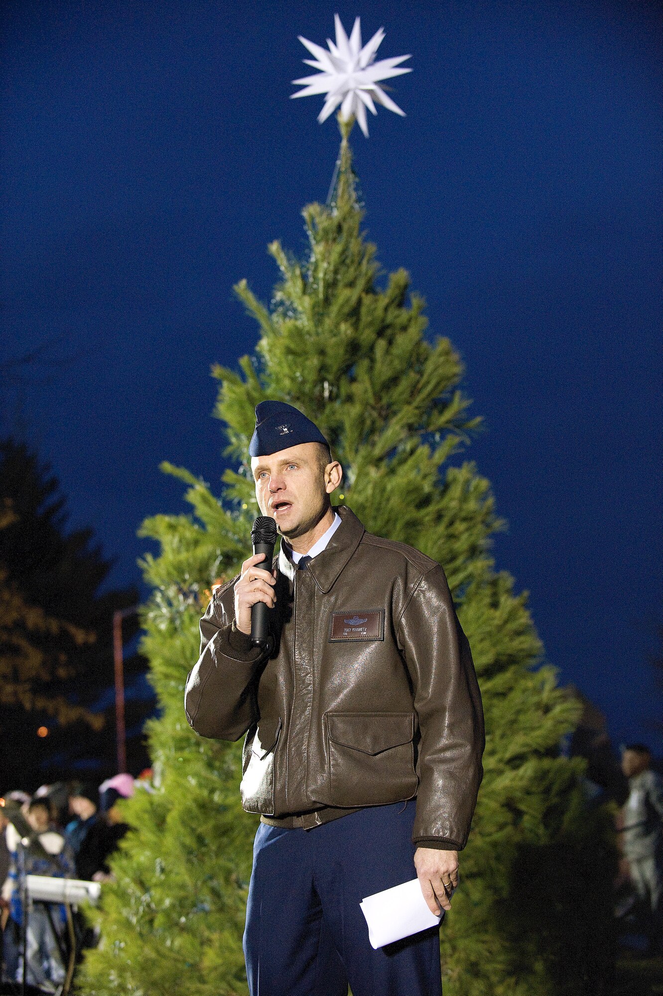 Col.  Anthony Krawietz, 436th Airlift Wing vice commander, speaks during the Christmas tree and Menorah lighting Dec. 2, 2010, at the Dover AFB chapel. (U.S. Air Force photo by Jason Minto/Released)